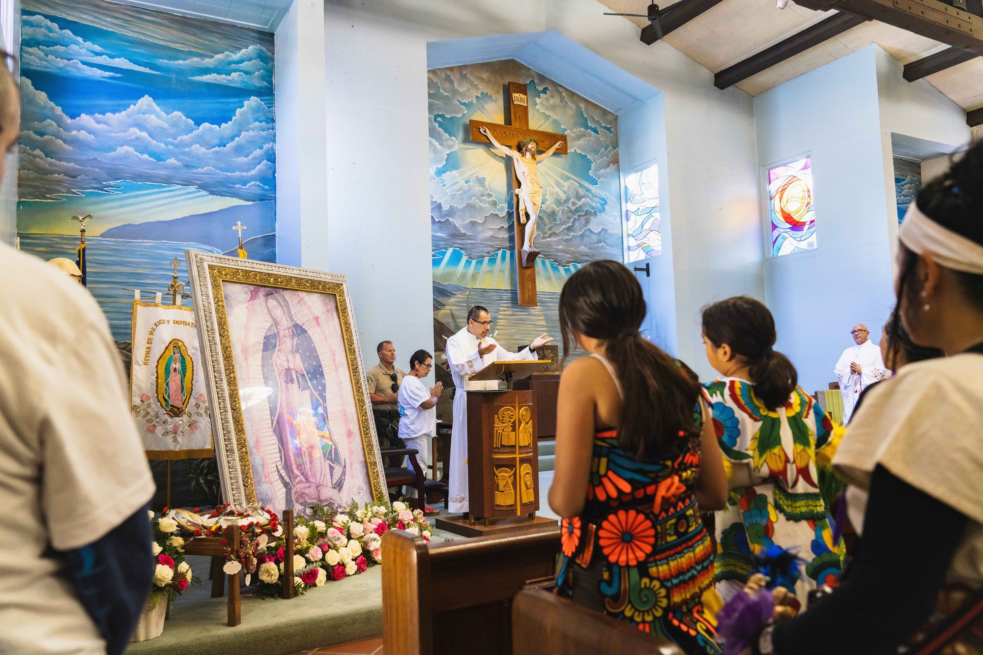 LA Catholics pray before the image of Our Lady of Guadalupe, which kicked off its annual pilgrimage at St. Catherine of Alexandria Church on Catalina Island. (Isabel Cacho)
