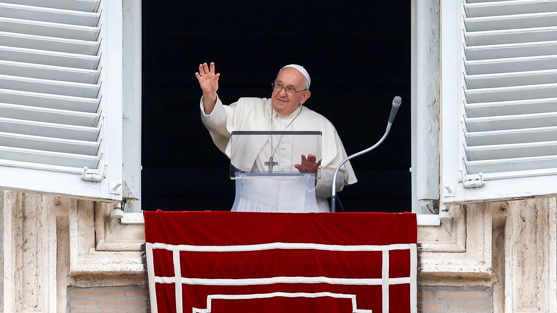 Pope Francis greets to an estimated 20,000 visitors gathered in St. Peter's Square at the Vatican to pray the Angelus Nov. 1, 2023, the feast of All Saints. (CNS/Lola Gomez)