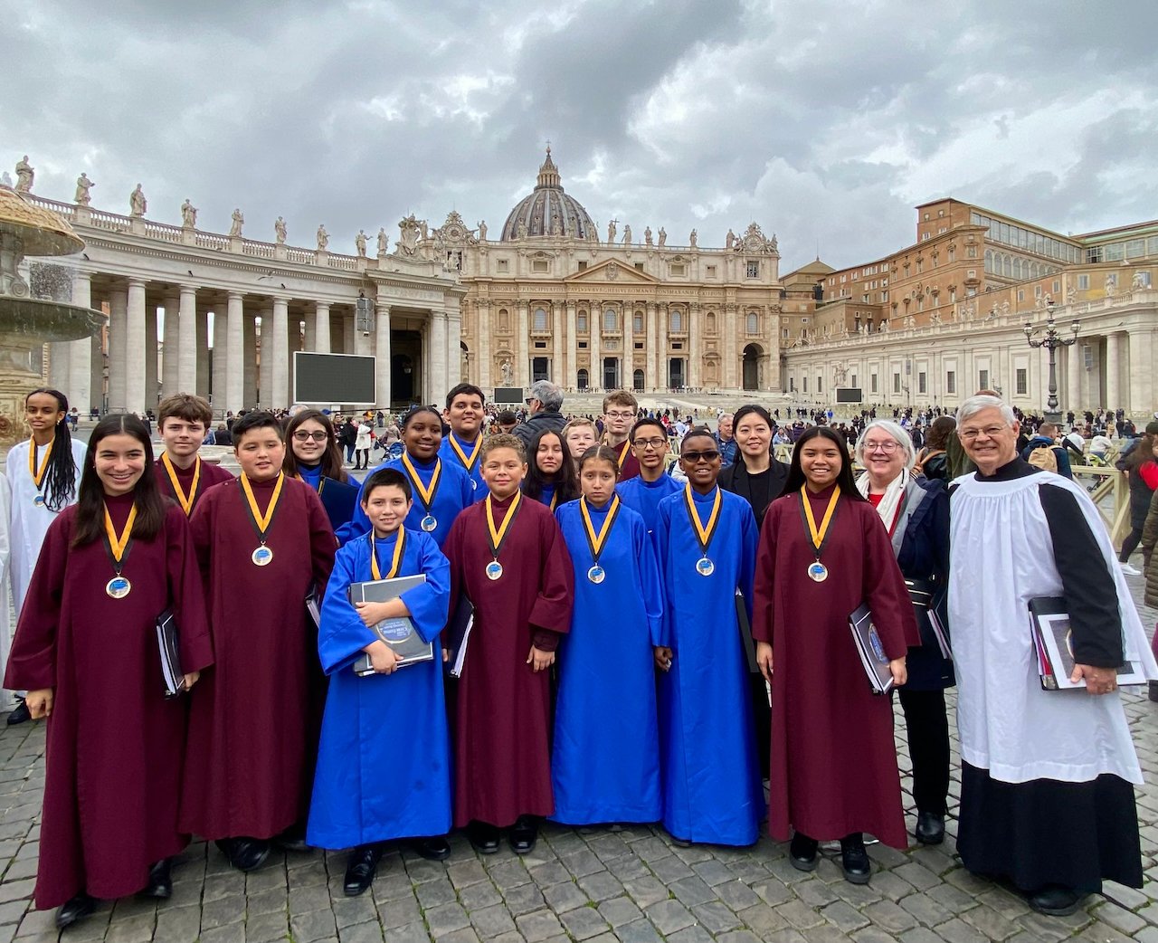 The choir of singers from St. Andrew Church in Pasadena and Pueri Cantores San Gabriel Valley pose in front of St. Peter’s Basilica, where they performed for Pope Francis. (Submitted photo)