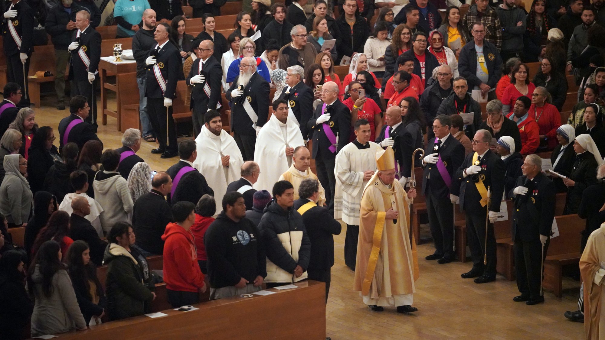 Los Angeles Archbishop Jose H. Gomez processes in past the thousands who attended the Requiem Mass for the Unborn at the Cathedral of Our Lady of the Angels on Jan. 20. (Archdiocese of Los Angeles)