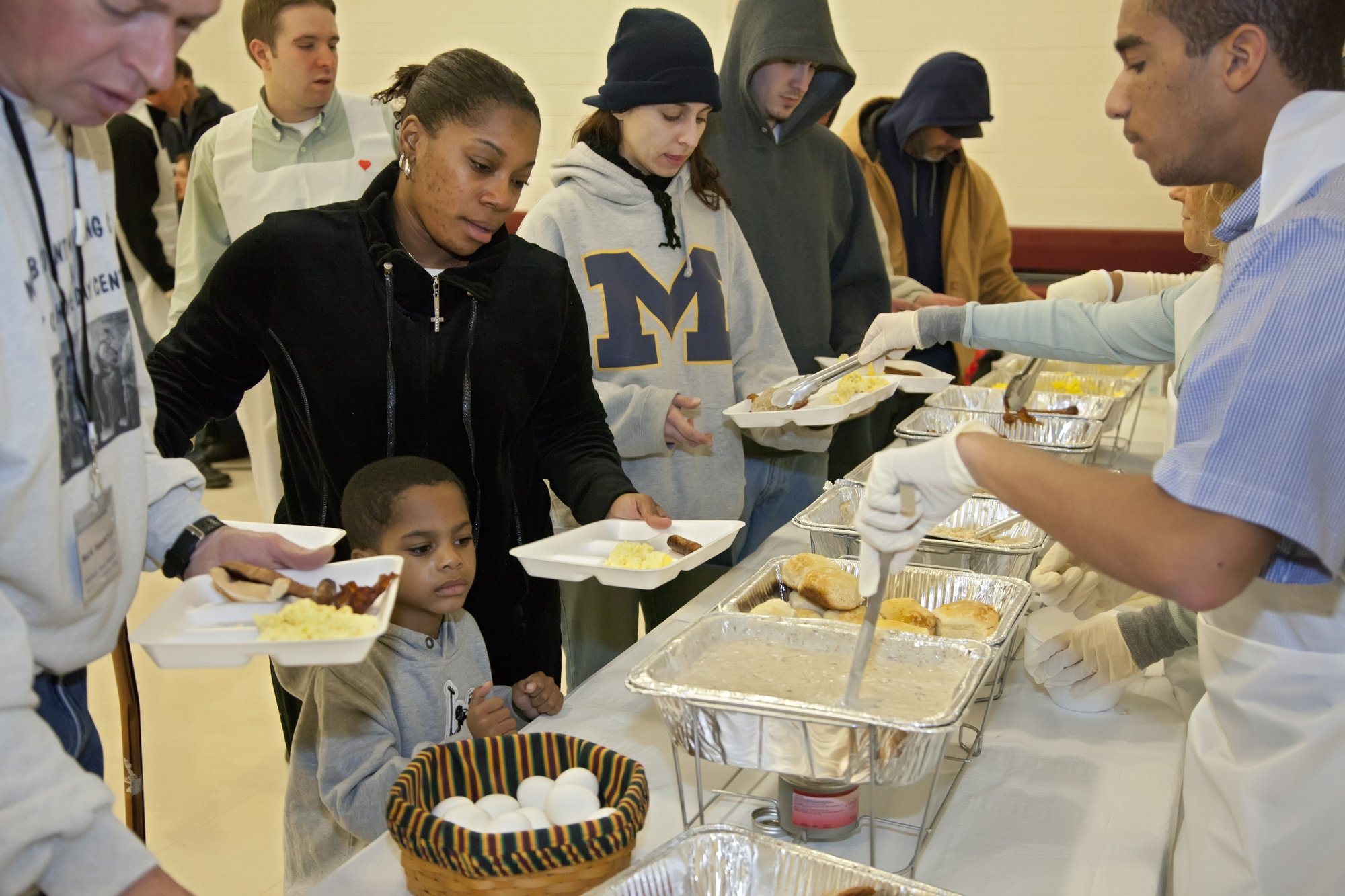 Volunteers serve breakfast to the needy at a shelter in Mount Clemens, Michigan, in this 2020 file photo. (CNS photo/Jim West) (CNS/Jim West)
