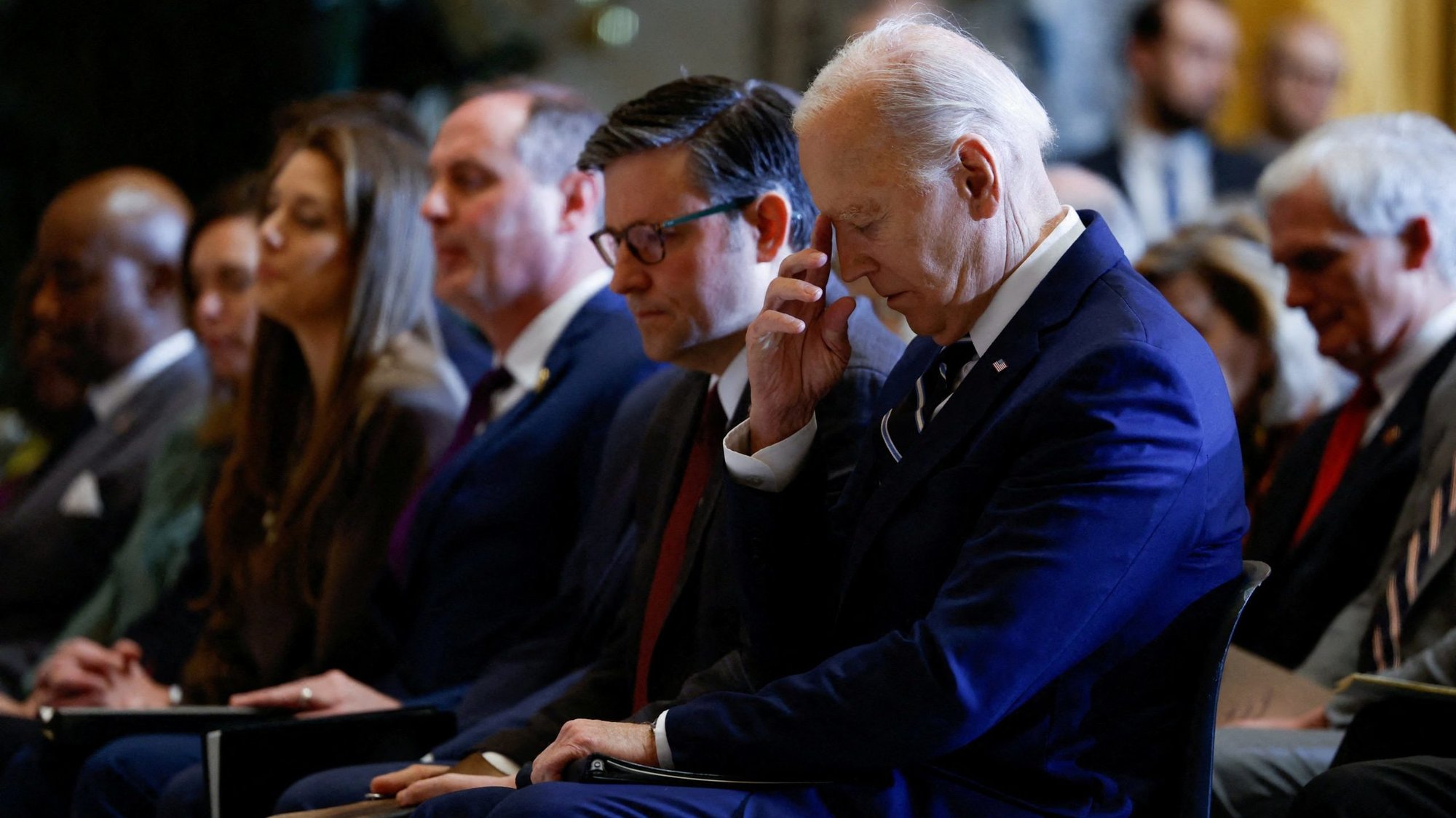 U.S. President Joe Biden pauses as he sits alongside House Speaker Mike Johnson, R-La., during the annual National Prayer Breakfast at the U.S. Capitol in Washington Feb. 1, 2024. (OSV News photo/Evelyn Hockstein, Reuters)