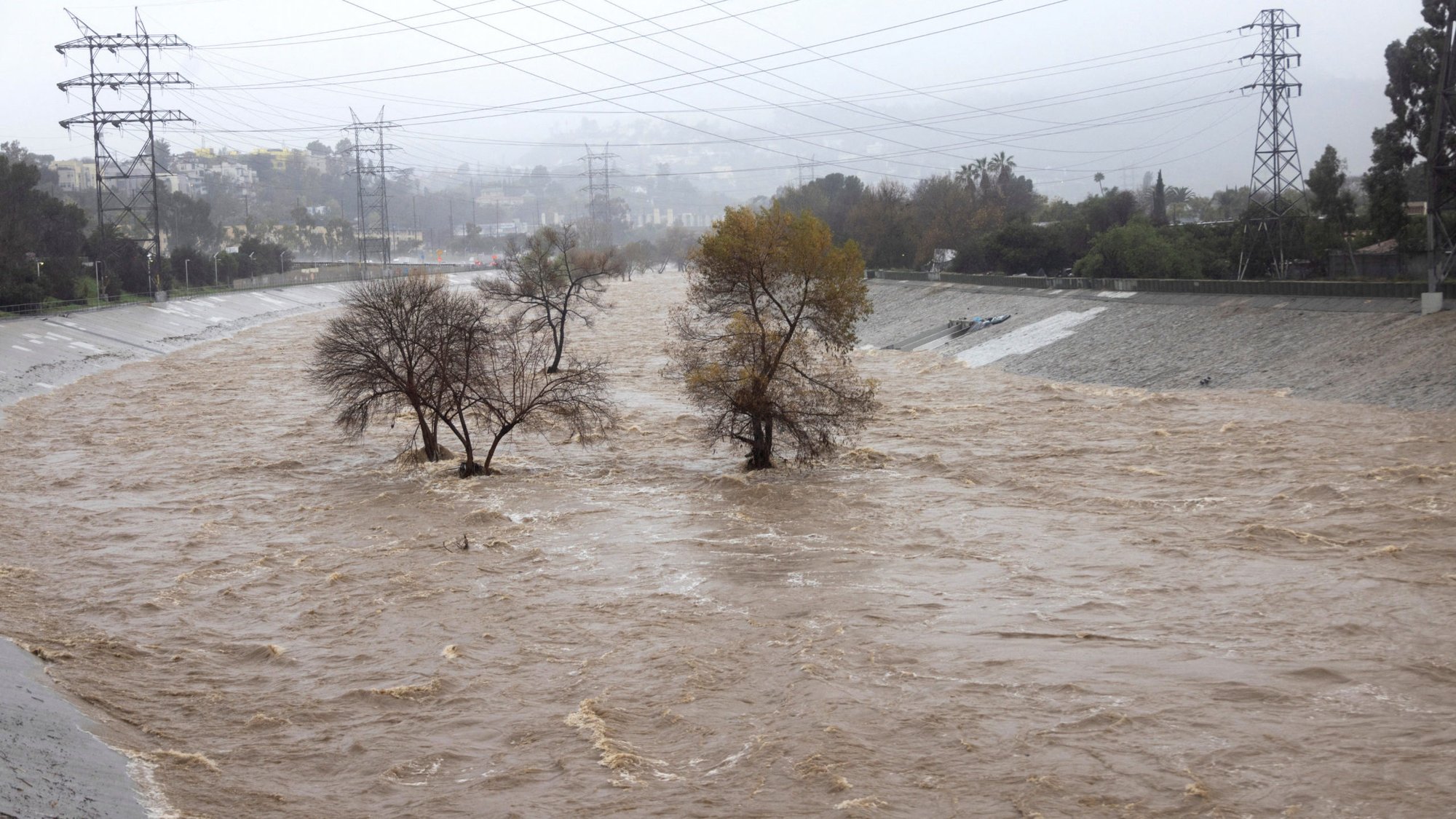 The Los Angeles River in Studio City is pictured on Feb. 5 during heavy rains. One of the wettest storms in Southern California history unleashed at least 475 mudslides in the Los Angeles area after dumping more than half the amount of rainfall the city typically gets in a season in just two days. (OSV News/Aude Guerrucci, Reuters)