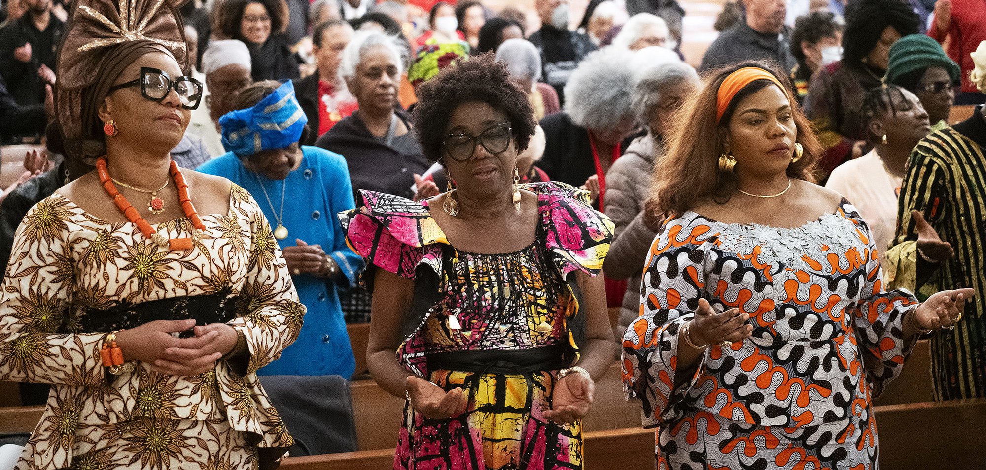 Attendees pray during the African American Catholic Center for Evangelization's 22nd Annual Black History Mass on Feb. 10 at the Cathedral of Our Lady of the Angels. (Victor Alemán)