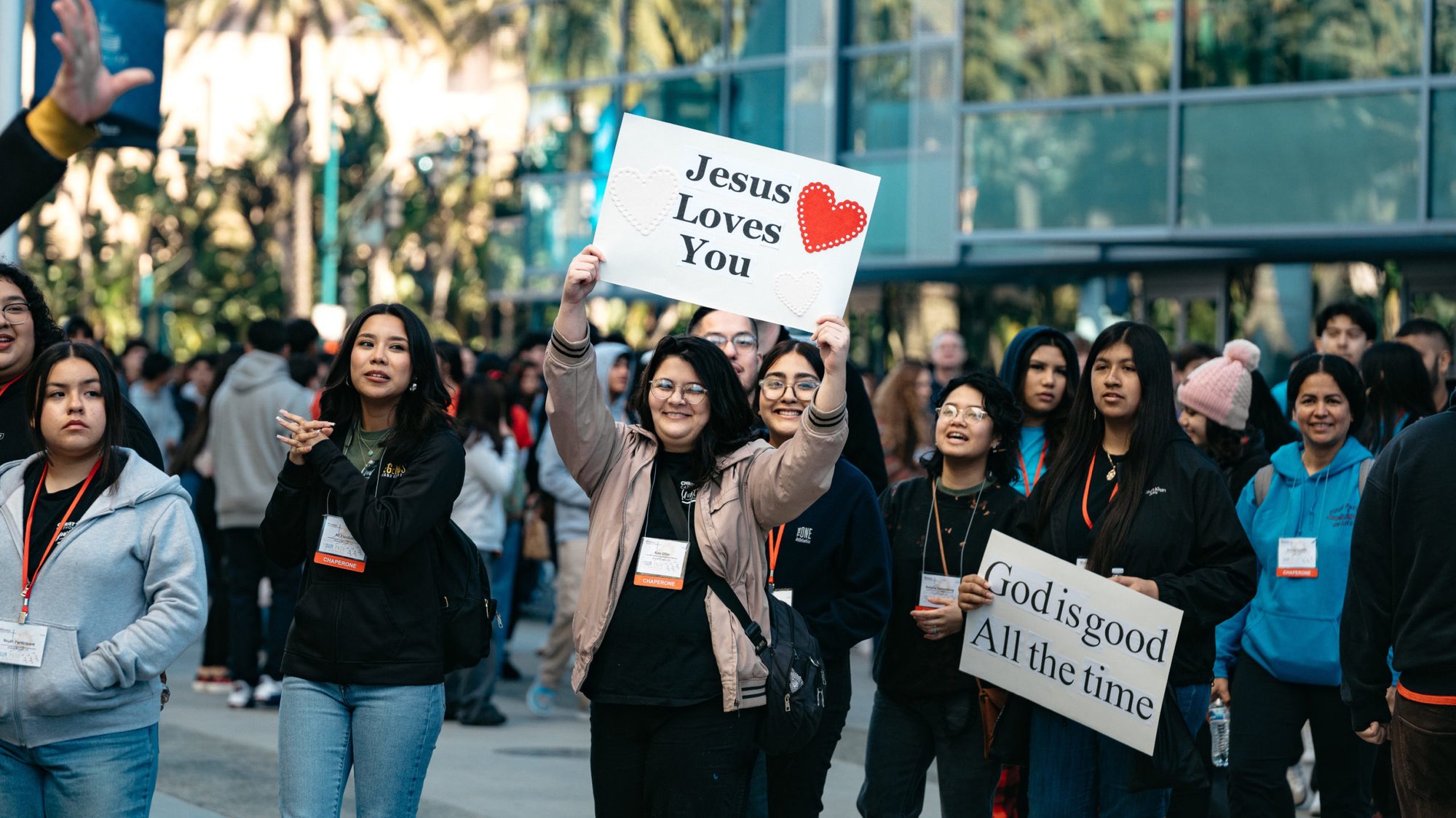 Young people and chaperones hold up signs at the Youth Day portion of the 68th Los Angeles Religious Education Conference in Anaheim on Feb. 16. (Archdiocese of Los Angeles)