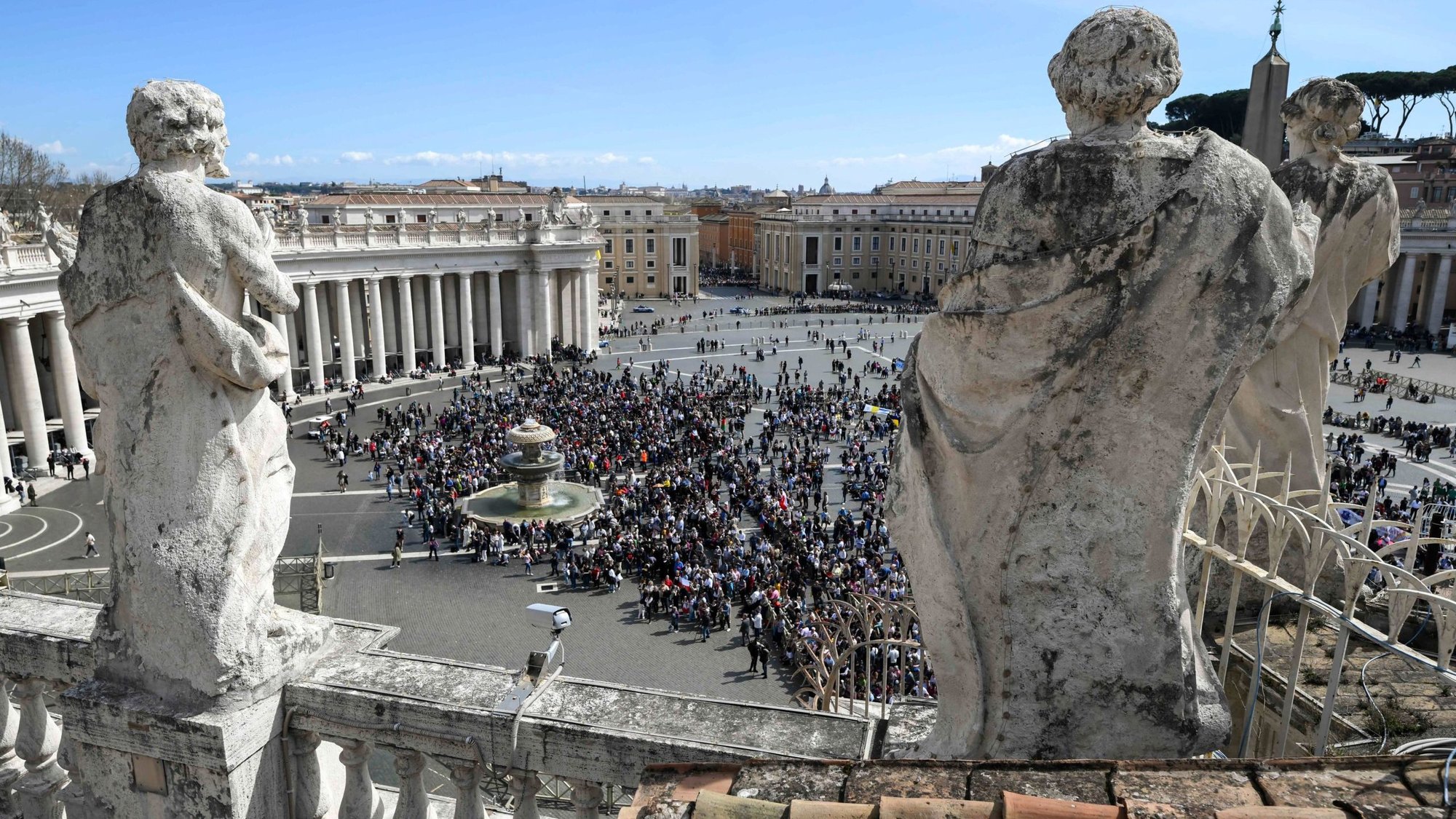 Visitors gather in St. Peter’s Square to pray the Angelus with Pope Francis at the Vatican March 17, 2024. (CNS/Vatican Media)