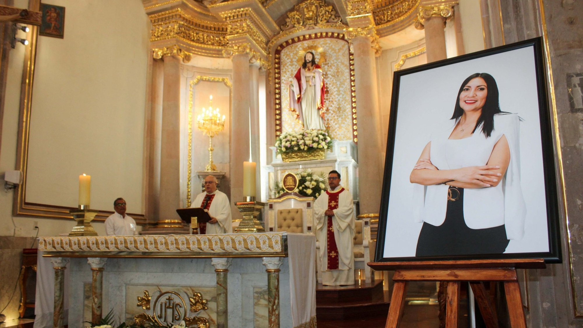 A framed photo of Gisela Gaytán Gutiérrez, candidate for the ruling party Morena who was running for mayor of Celaya, Mexico, is seen during her funeral Mass April 3, 2024, at Immaculate Conception Cathedral in Celaya in the state of Guanajuato, northwest of Mexico City. She was killed April 1 by unknown assailants. (OSV News photo/Juan Moreno, Reuters)
