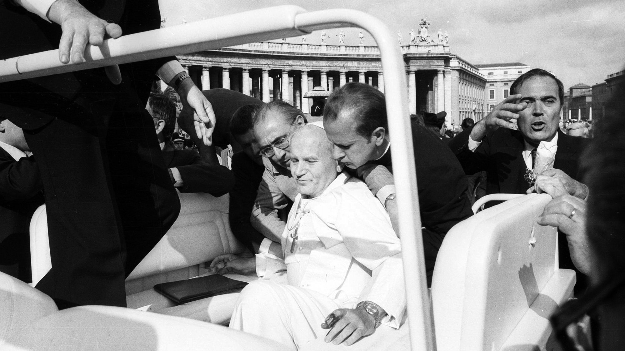 St. John Paul II is assisted by aides after being shot in St. Peter's Square May 13, 1981. The Polish pope, who was shot at the start of his weekly general audience by Mehmet Ali Agca, was convinced that he owed his life to Our Lady of Fatima. (CNS photo/L'Osservatore Romano)