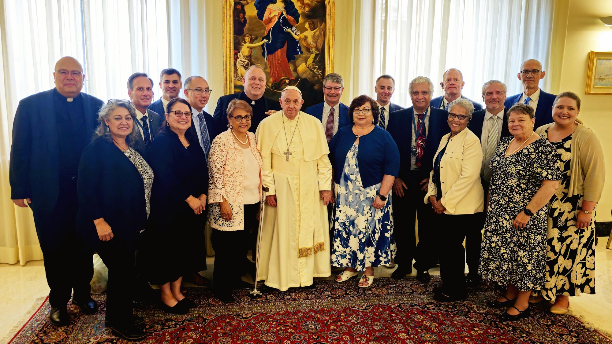 Pope Francis poses for a photo with community organizers from the West/Southwest Industrial Areas Foundation after a private meeting in the Domus Sanctae Marthae at the Vatican Aug. 28, 2024. (CNS/courtesy of IAF)
