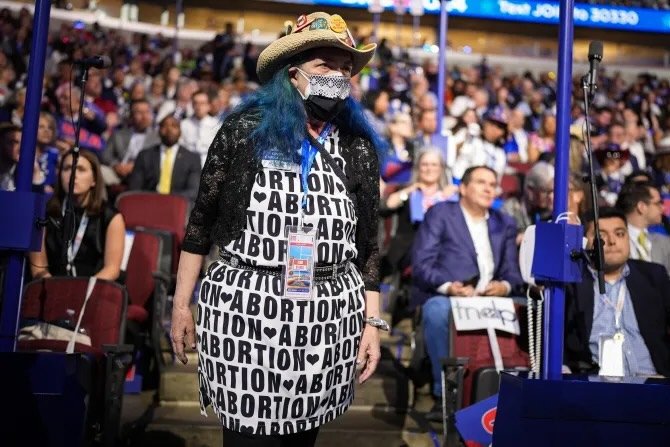 A pro-abortion attendee stands during the first day of the Democratic National Convention at the United Center on Aug. 19, 2024, in Chicago. (Andrew Harnik/Getty Images)