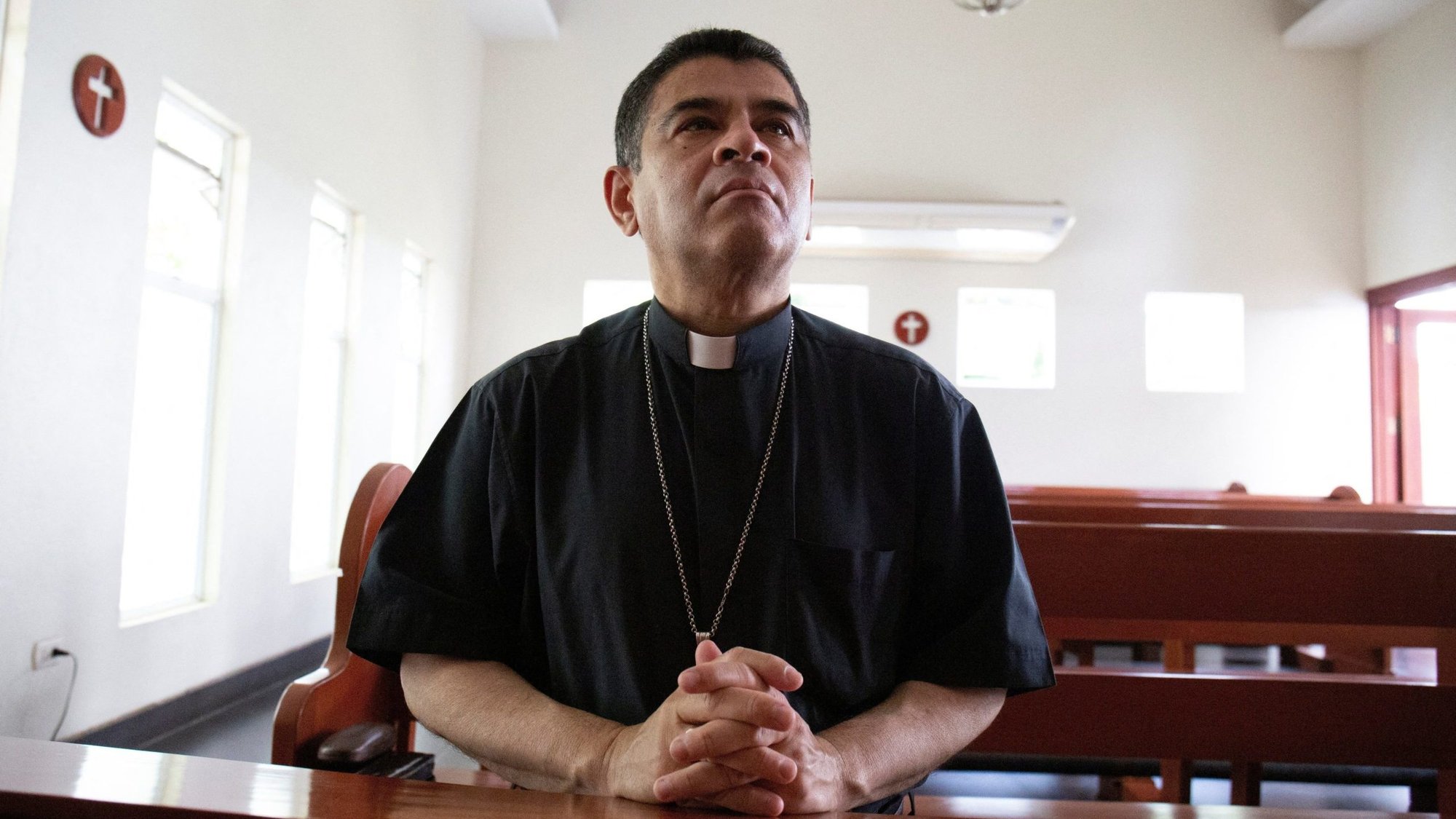 Bishop Rolando Álvarez of Matagalpa, Nicaragua, who was exiled by Nicaraguan President Daniel Ortega, prays at a Catholic church in Managua May 20, 2022. (OSV News photo/Maynor Valenzuela, Reuters)