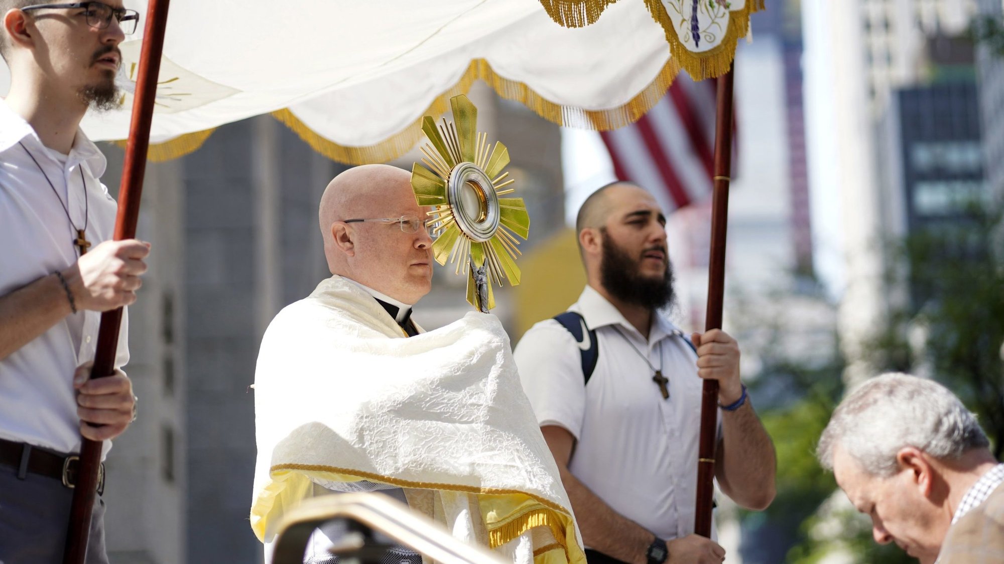 Father Roger Landry, National Eucharistic Pilgrimage chaplain, pauses to offer a blessing with the monstrance as pilgrims on the National Eucharistic Pilgrimage's Seton Route arrive for Mass at St. Patrick's Cathedral in New York City May 26, 2024. The Pontifical Mission Societies USA announced Sept. 5, 2024, that Father Landry has been named its new national director, effective in January. (OSV News photo/Gregory A. Shemitz)
