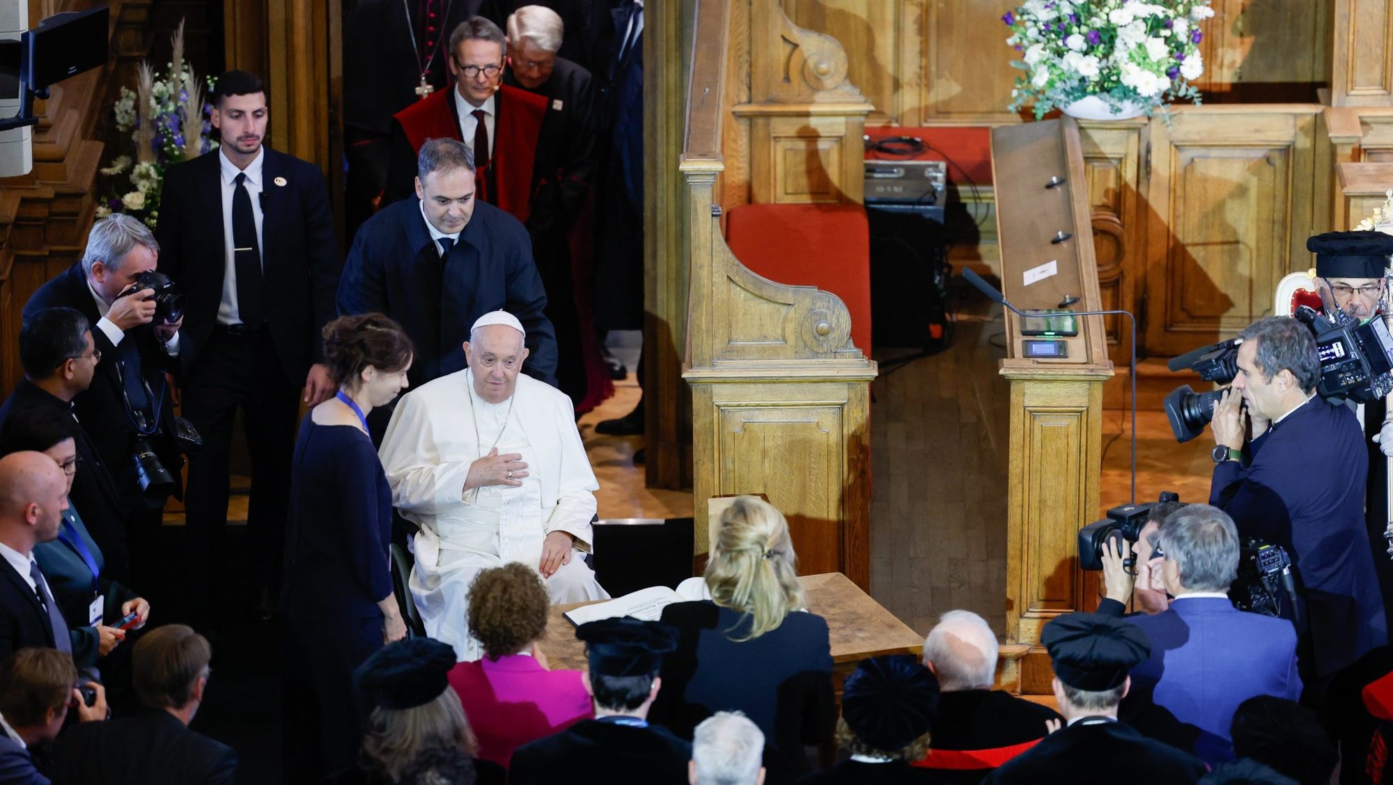 Pope Francis arrives at KU Leuven, a Catholic research university in the city of Leuven, Belgium, Sept. 27, 2024. Founded in 1425 with a decree by Pope Martin V, it is the oldest Catholic university in the world. (CNS photo/Lola Gomez)