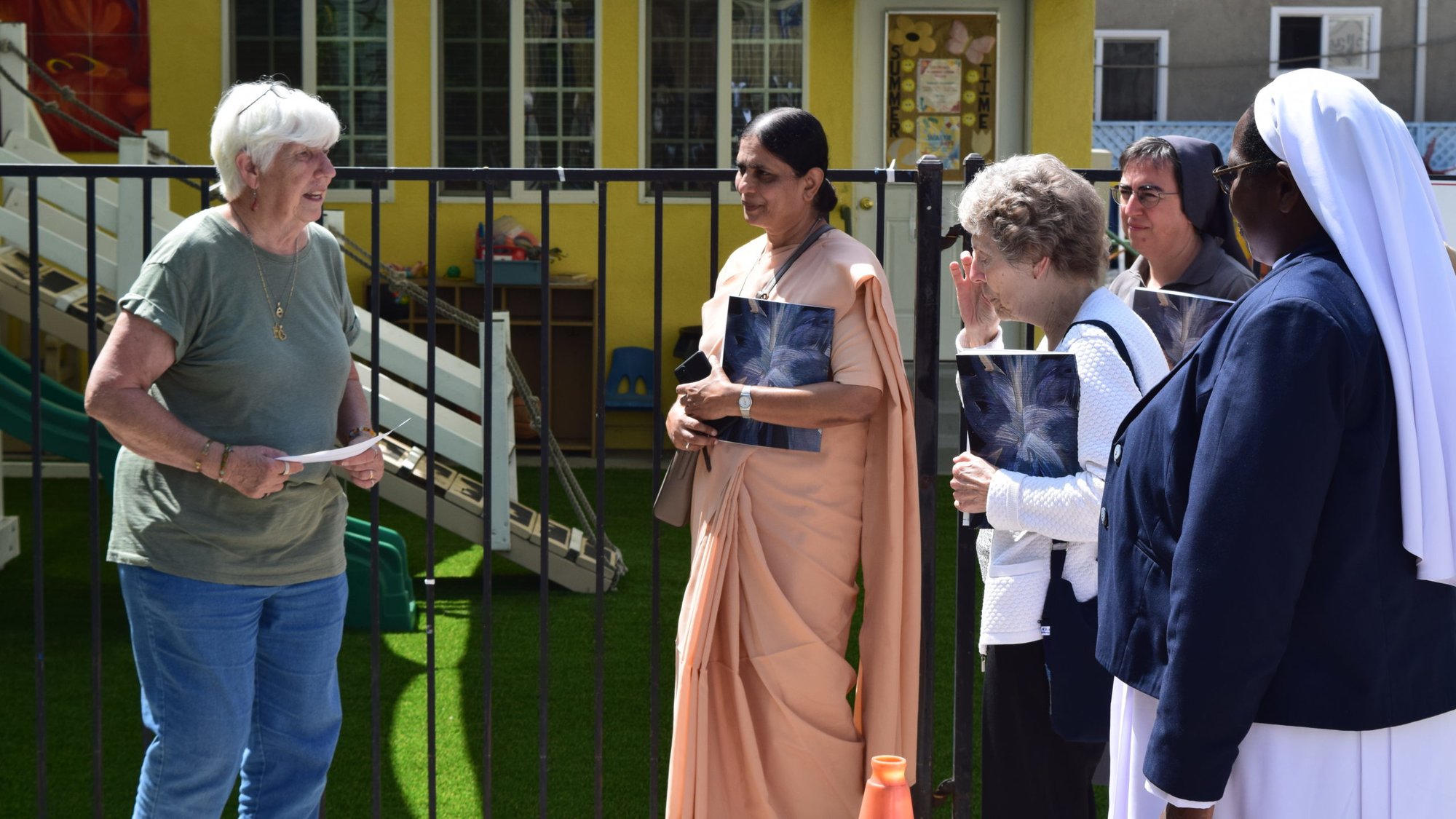 Sister Judy Vaughan shows visiting sisters around Alexandria House, the shelter for homeless women and children in Koreatown she founded in 1996. (Kayleen Sullivan/Conrad N. Hilton Foundation)