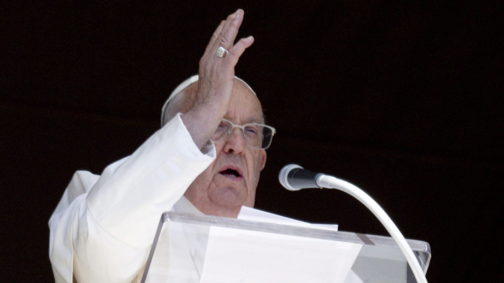 From the window of his studio in the Apostolic Palace, Pope Francis gives his blessing to people gathered in St. Peter's Square at the Vatican for the recitation of the Angelus prayer Oct. 13, 2024. (CNS photo/Vatican Media)