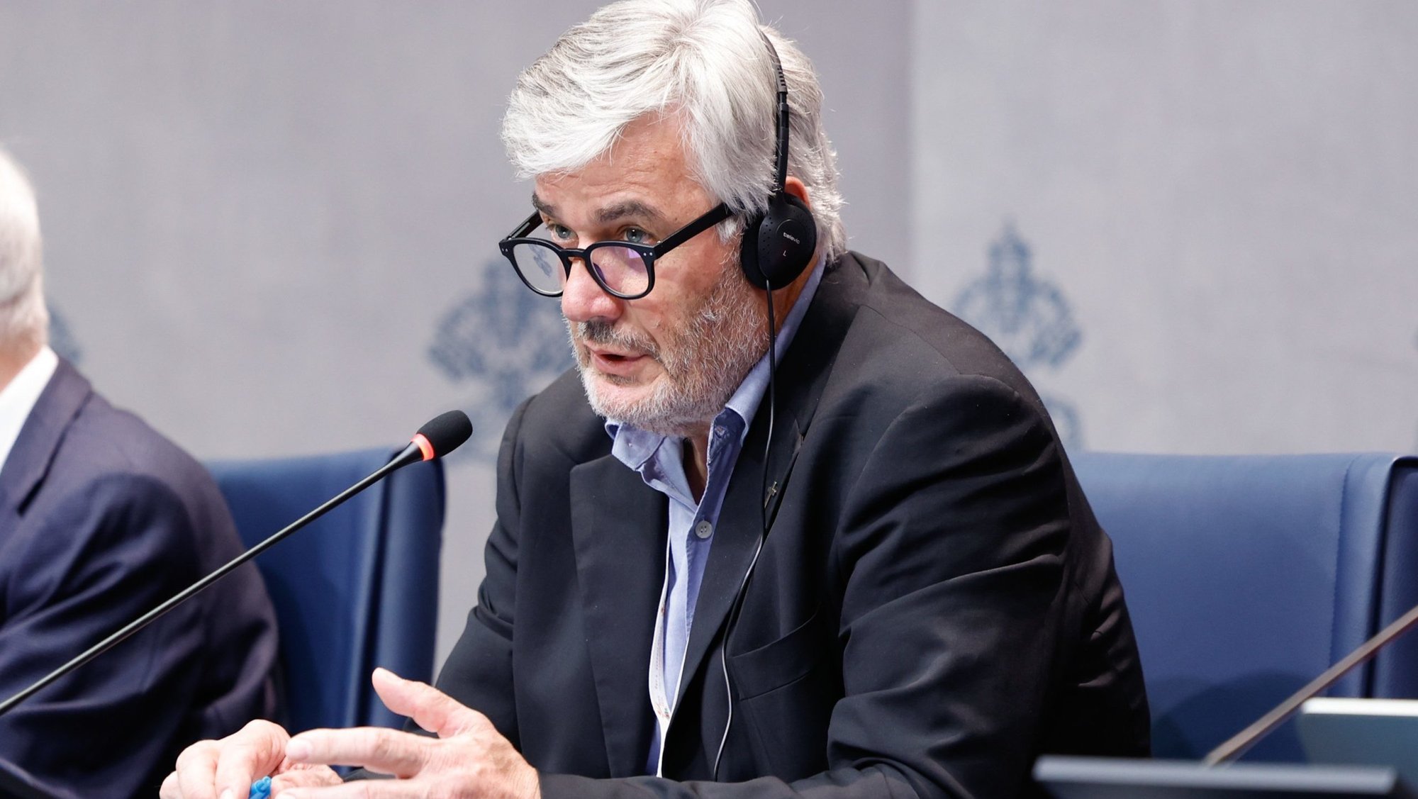 Father Dario Vitali, coordinator of theological experts assisting the synod and professor of dogmatic theology at Rome's Pontifical Gregorian University, speaks during a press briefing on the synod at the Vatican Oct. 16, 2024. (CNS photo/Lola Gomez)