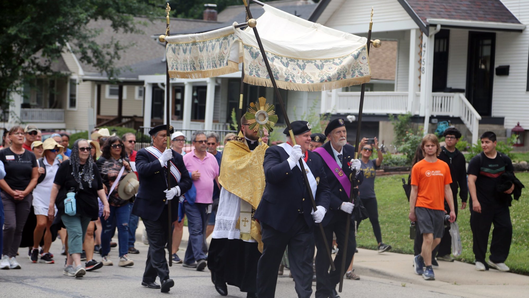 The St. Junipero Serra Route of the National Eucharistic Pilgrimage processes down Mission Road in Roeland Park, Kan., in the Archdiocese of Kansas City June 28, 2024. Four Eucharistic processions along various stretches of Mission Road took place, playing on the theme "Mission." Route highlights were announced Oct. 15 for a 2025 National Eucharistic Pilgrimage along the "Drexel Route" from Indianapolis to Los Angeles May 18-June 22. (OSV News photo/Megan Marley)