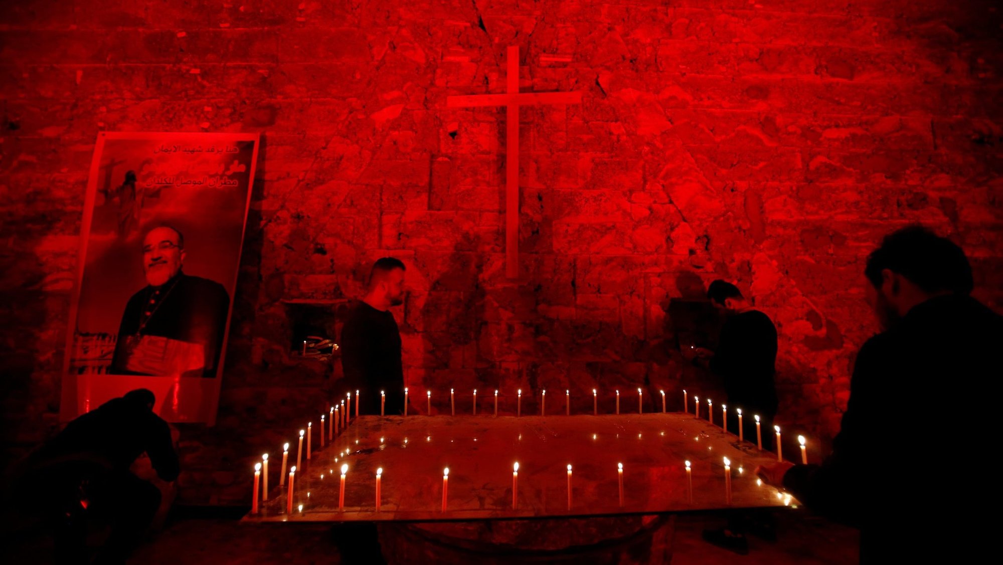 A file photo shows the Chaldean Church of St. Paul in Mosul, Iraq, illuminated with red light in protest against the persecution of Christians around the world. (OSV News photo/Khalid Al-Mousily, Reuters)