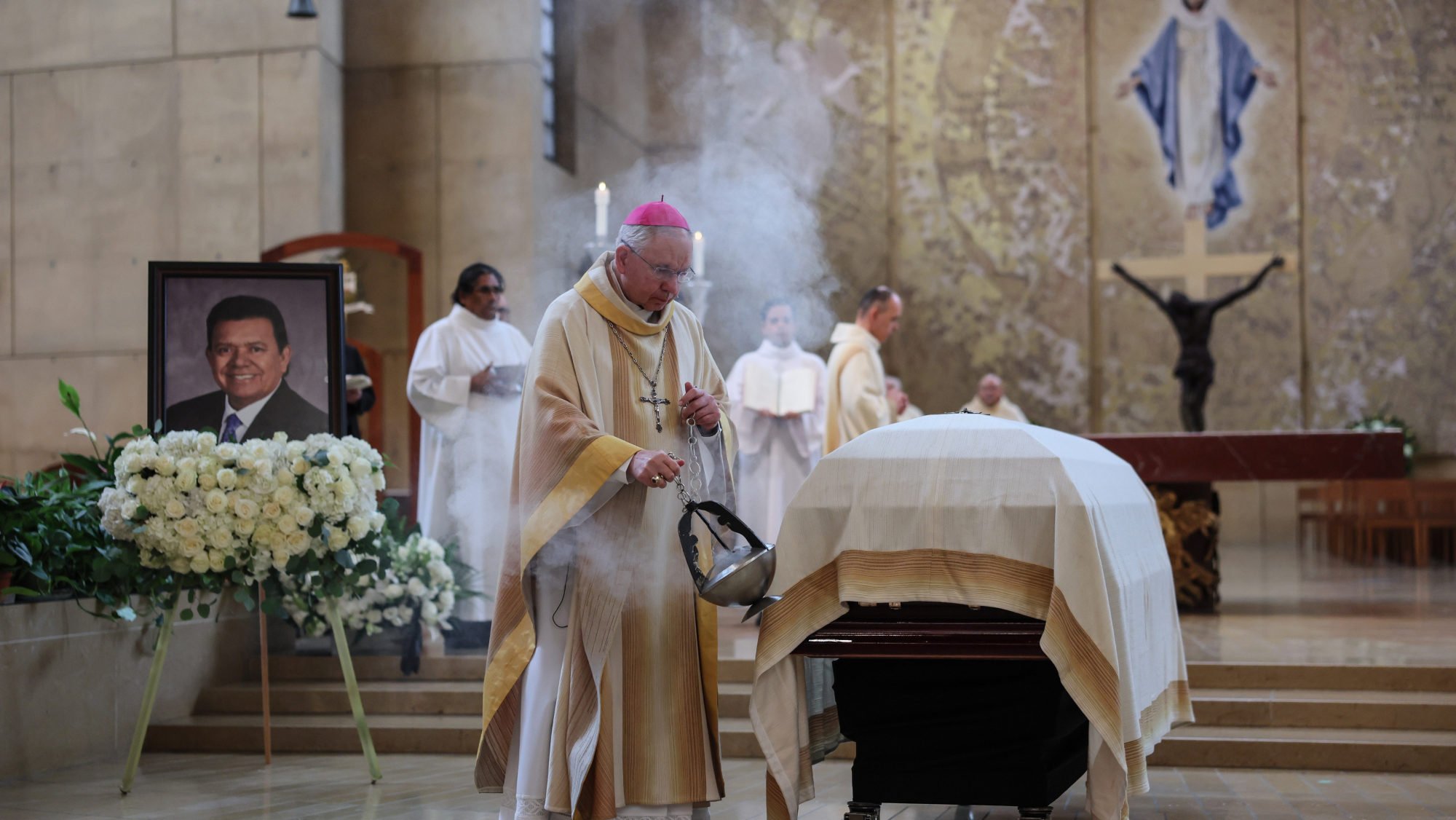 Los Angeles Archbishop José H. Gomez waves incense over the casket of Dodgers legend Fernando Valenzuela during his funeral Mass on Nov. 6 at the Cathedral of Our Lady of the Angels. (Robert Gauthier, Los Angeles Times / Pool)