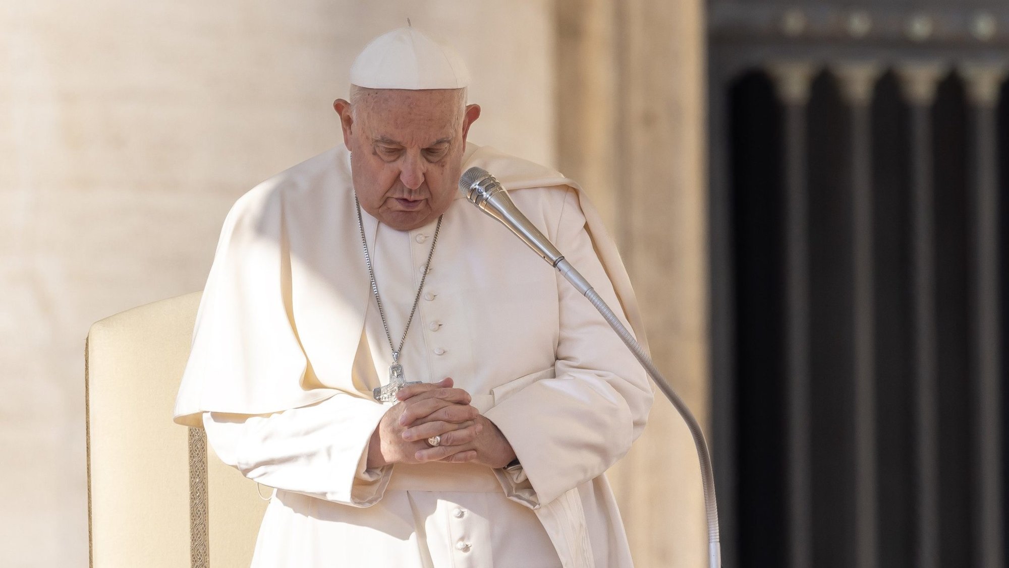 Pope Francis prays during his weekly general audience in St. Peter's Square at the Vatican Nov. 6, 2024. (CNS photo/Pablo Esparza)