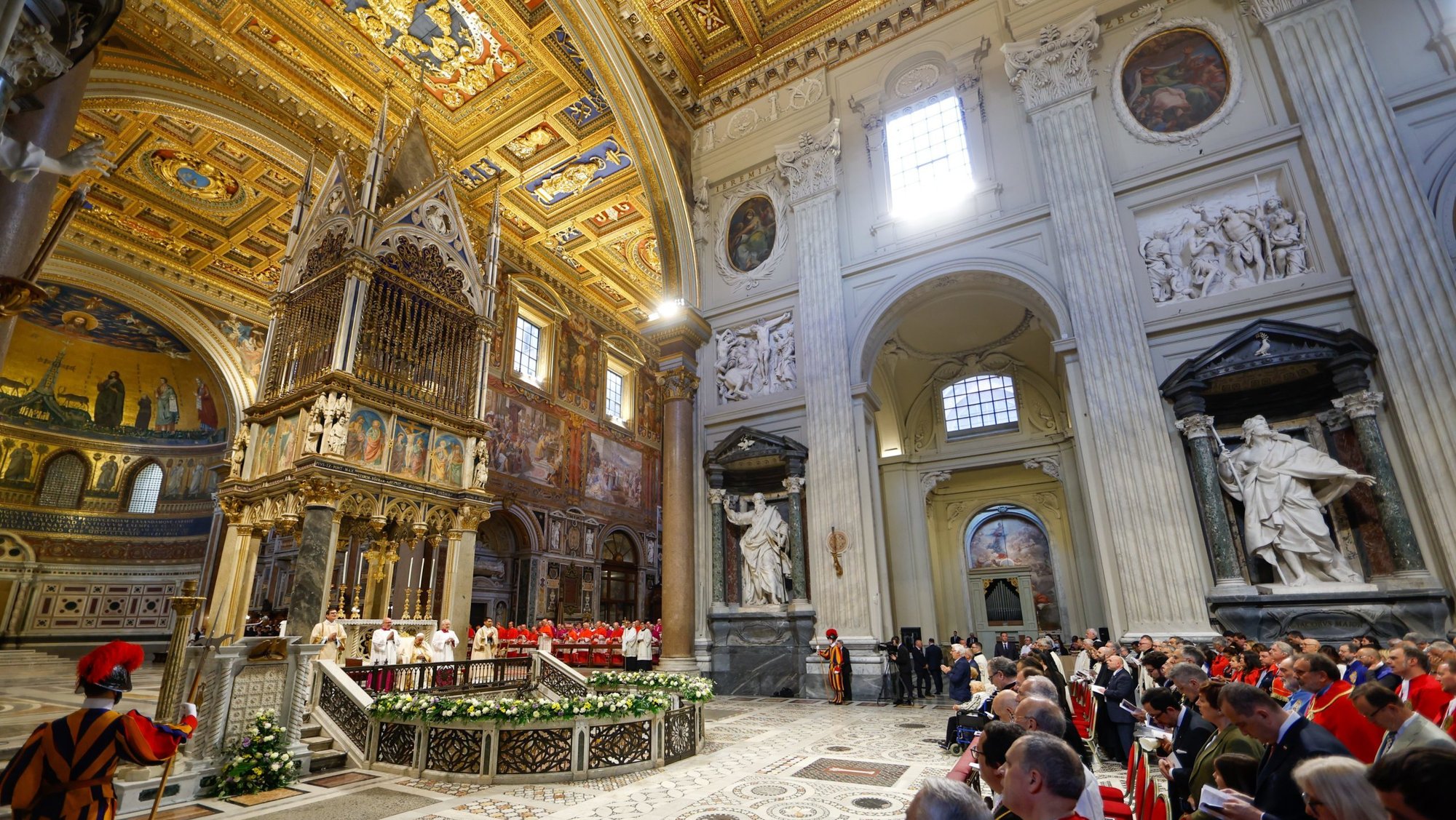 Members of confraternities and sodalities, wearing their capes, join Pope Francis for Mass on the feast of the Body and Blood of Christ in Rome's Basilica of St. John Lateran June 2, 2024. Nov. 9 marks the 1,700th anniversary of the Dedication of the Archbasilica of St. John Lateran, the cathedral of Rome and the "Mother and Head of all the Churches in the City and the World."(CNS photo/Lola Gomez)