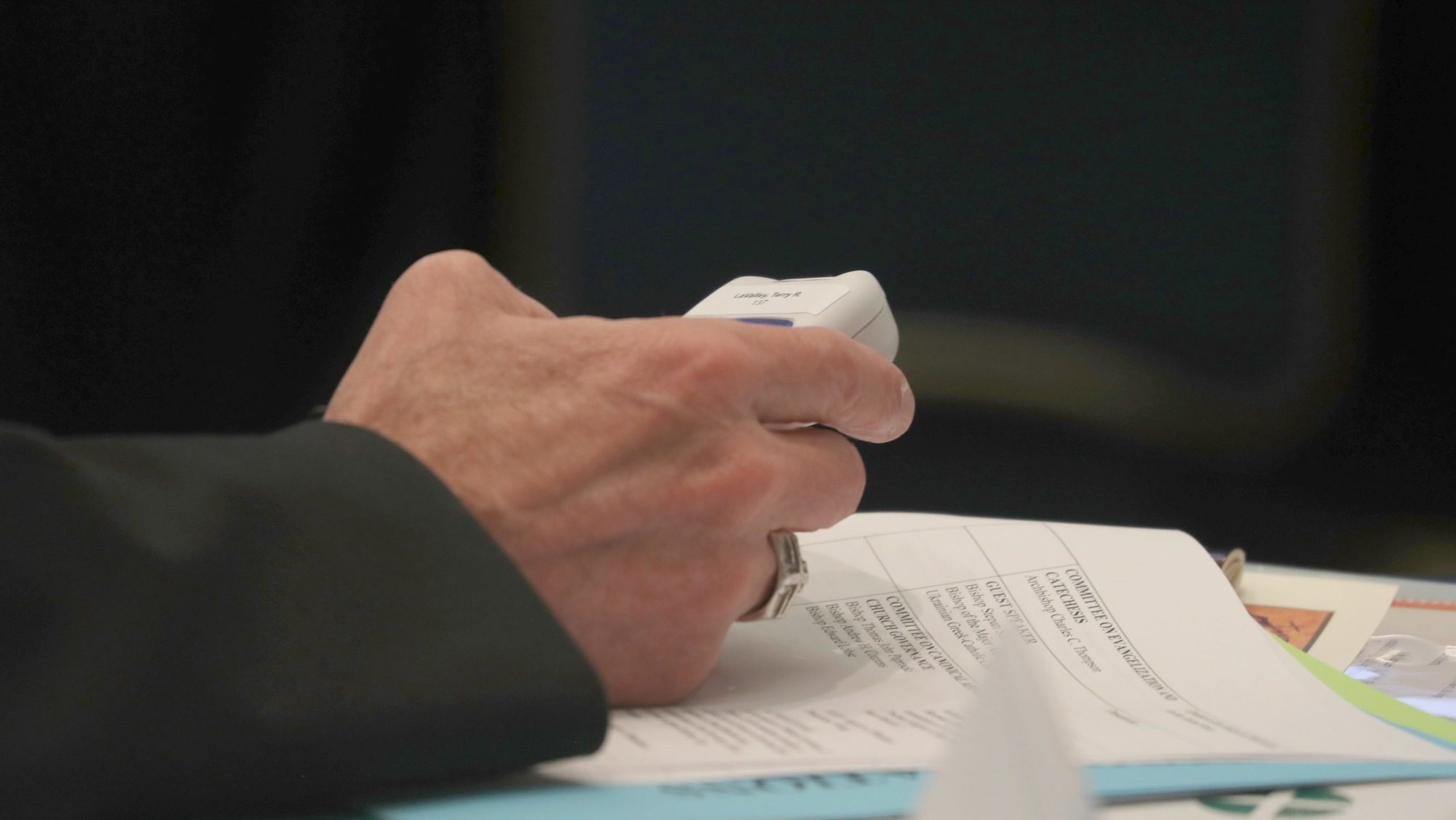 Bishop Terry R. LaValley of Ogdensburg, N.Y., holds his electronic voting machine during a Nov. 12, 2024, session of the fall general assembly of the U.S. Conference of Catholic Bishops in Baltimore. (OSV News photo/Bob Roller)