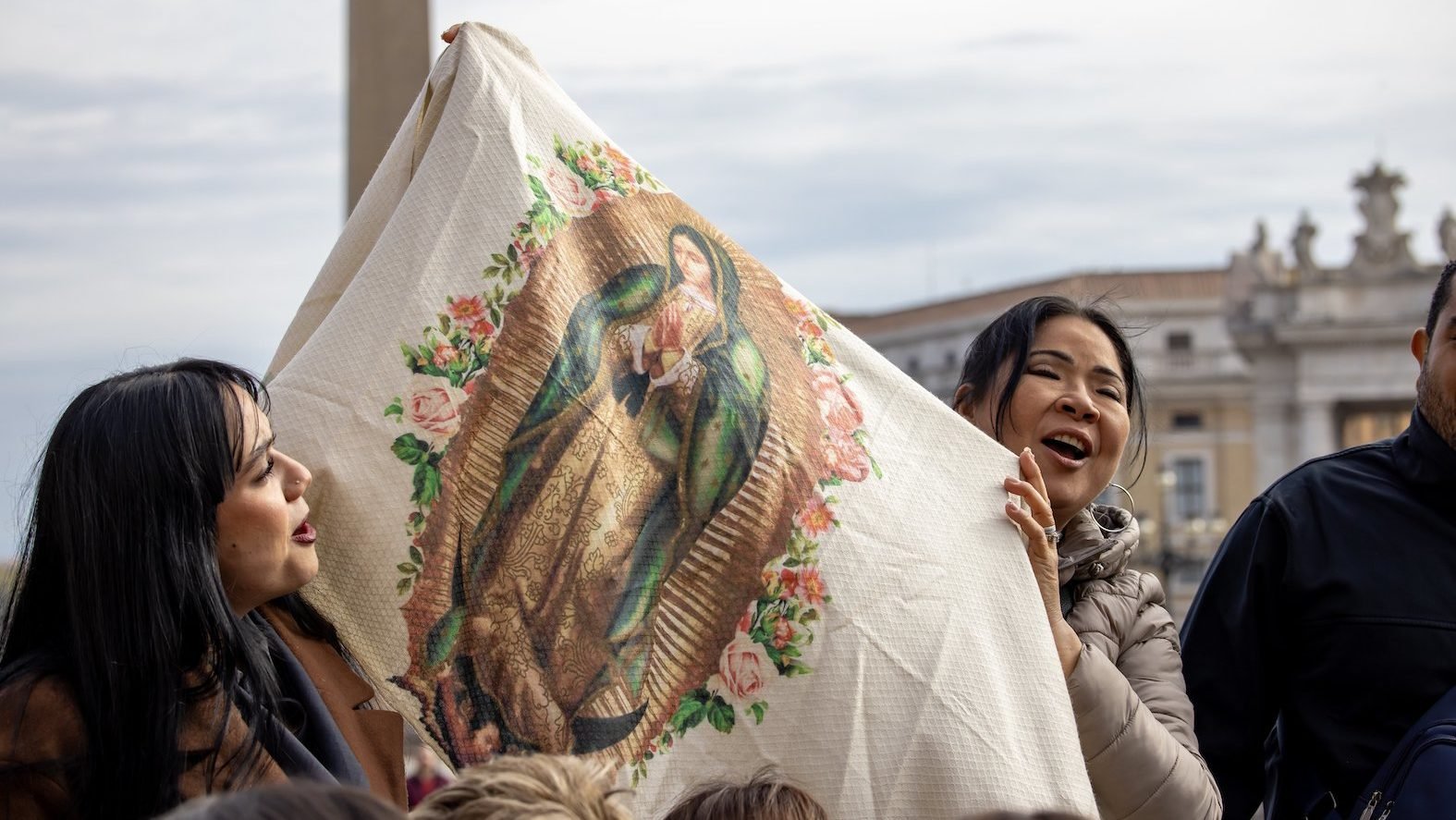 Women hold up an image of Our Lady of Guadalupe during Pope Francis' weekly general audience in St. Peter's Square at the Vatican Nov. 13, 2024. (CNS photo/Pablo Esparza)