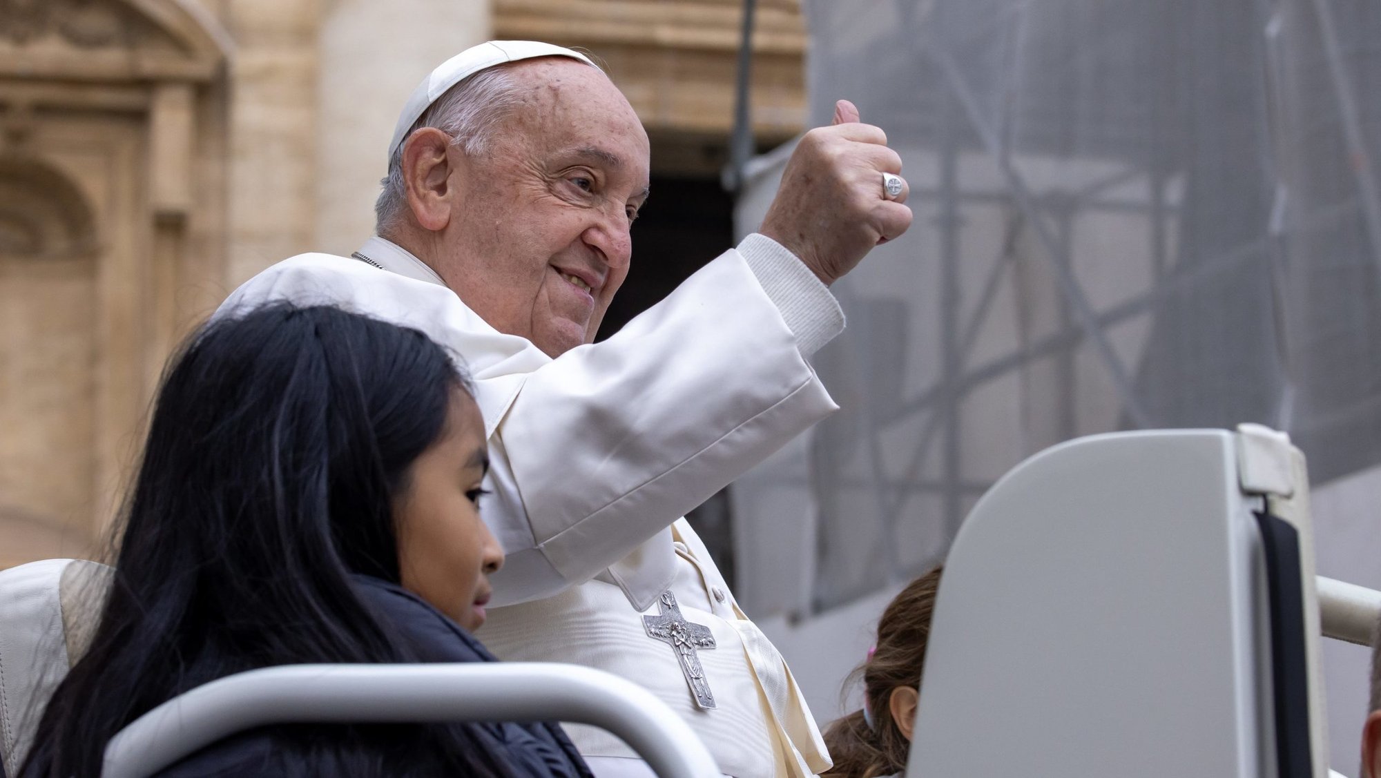 Pope Francis gives a thumbs-up from the popemobile in St. Peter's Square at the Vatican before his weekly general audience Nov. 20, 2024. (CNS photo/Pablo Esparza)