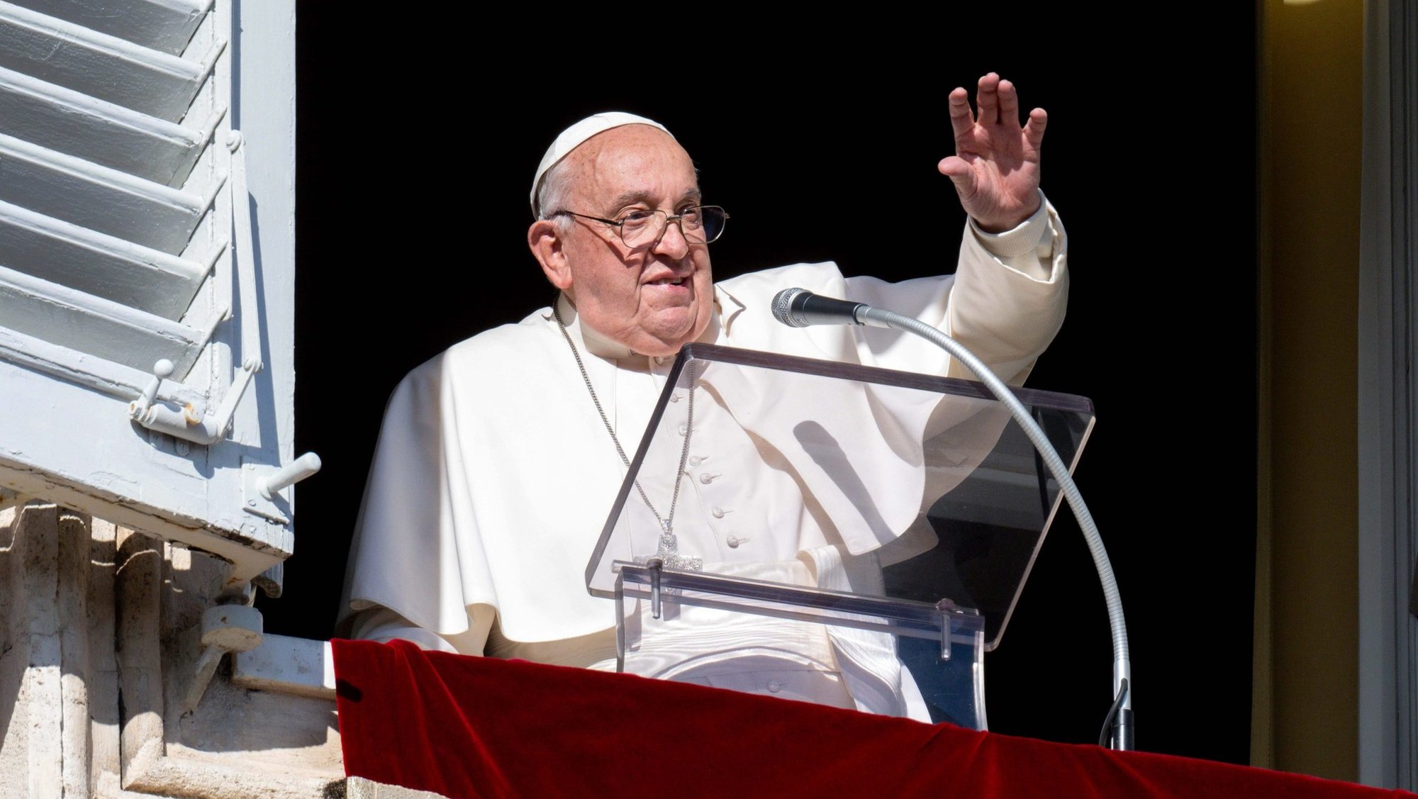 Pope Francis greets people joining him for the recitation of the Angelus prayer in St. Peter's Square at the Vatican Dec. 1, 2024. (CNS photo/Vatican Media)