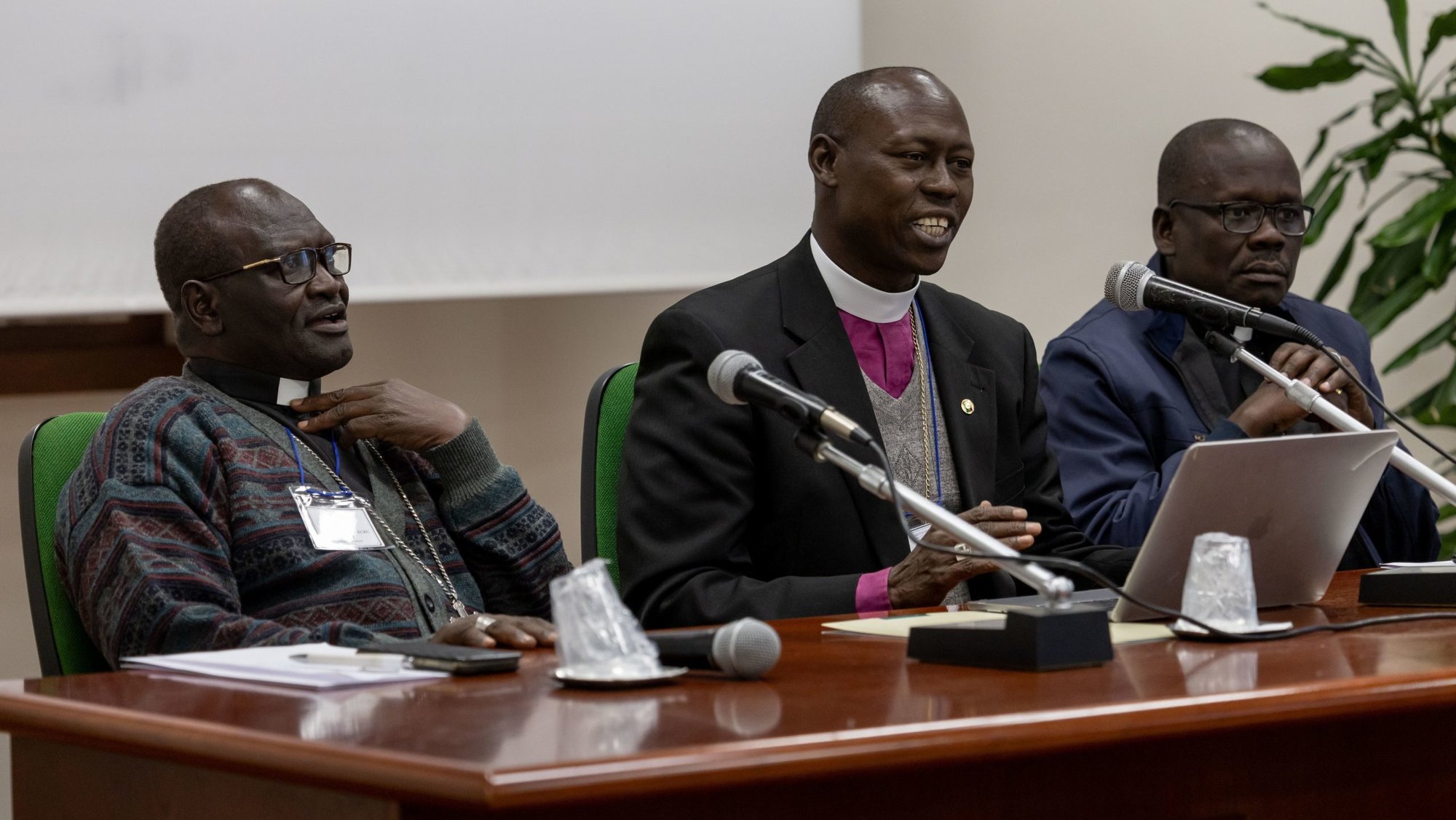 Anglican Archbishop Samuel Peni of Western Equatoria, South Sudan, Catholic Bishop Alex Sakor Eyobo of Yei, South Sudan, and Catholic Bishop Yunan Tombe Trille Kuku Andali of El Obeid, Sudan address the "Growing Together" summit sponsored by the International Anglican-Roman Catholic Commission on Unity and Mission Jan. 24, 2024, in Rome. Bishop Andali said Dec. 2 that he narrowly escaped execution in his country some days prior when he fell into the hands of the paramilitary Rapid Support Forces, engaged in a deadly war with the Sudan Armed Forces. (CNS photo/Neil Turner, IARCCUM)