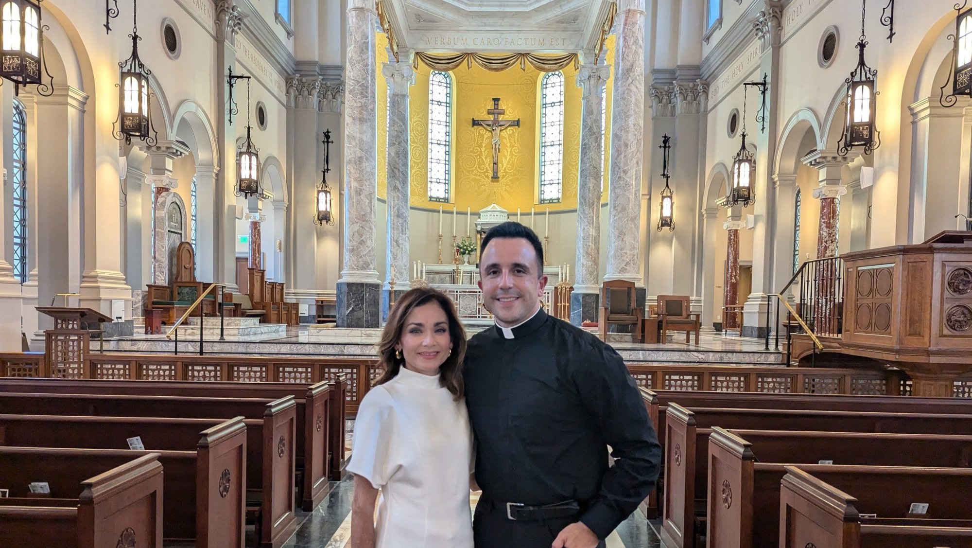 Lucia Herman and her son Father Danny Herman stand in the center aisle of the Cathedral of the Most Sacred Heart of Jesus in Knoxville, Tenn., in this undated photo. (OSV News/courtesy Catholic Extension Society)