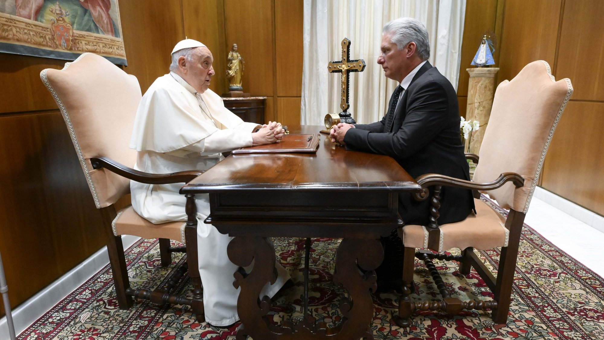 Pope Francis speaks with Cuban President Miguel Díaz-Canel during a private meeting June 20, 2023, in the papal studio of the Vatican audience hall. (CNS photo/Vatican Media)
