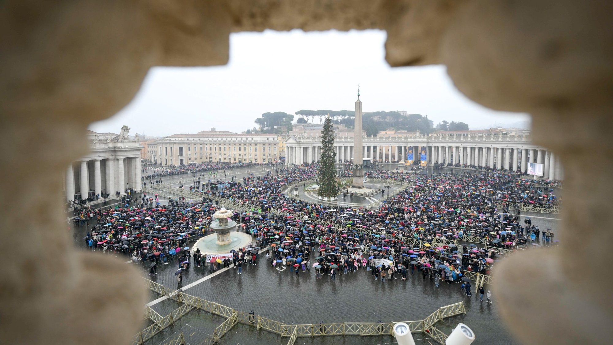 Visitors gather in St. Peter’s Square to join Pope Francis in praying the Angelus Jan. 5, 2025. (CNS photo/Vatican Media)