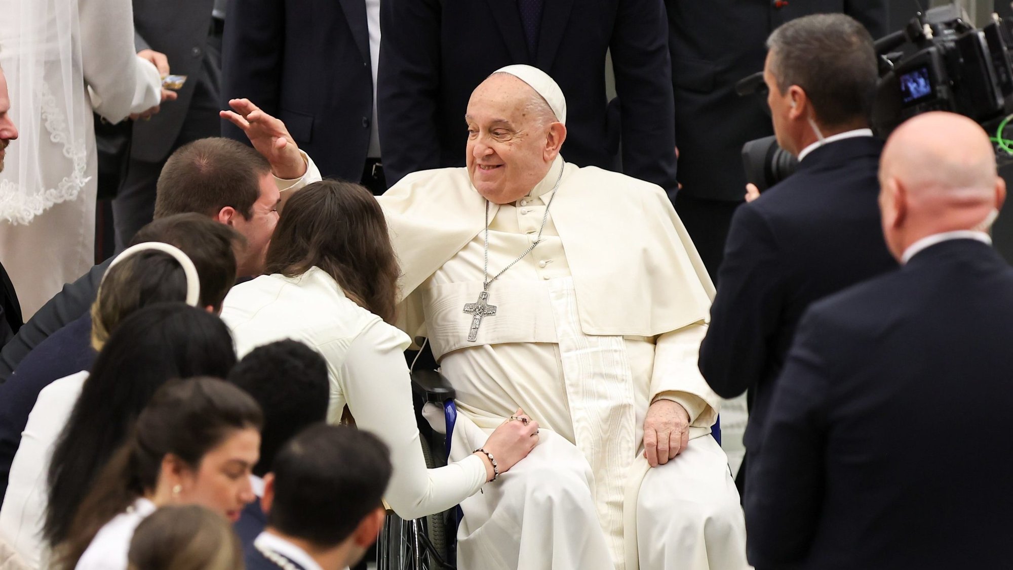 Pope Francis greets newlyweds at the conclusion of his weekly general audience in the Paul VI Audience Hall at the Vatican Jan. 8, 2025. (CNS photo/Lola Gomez)