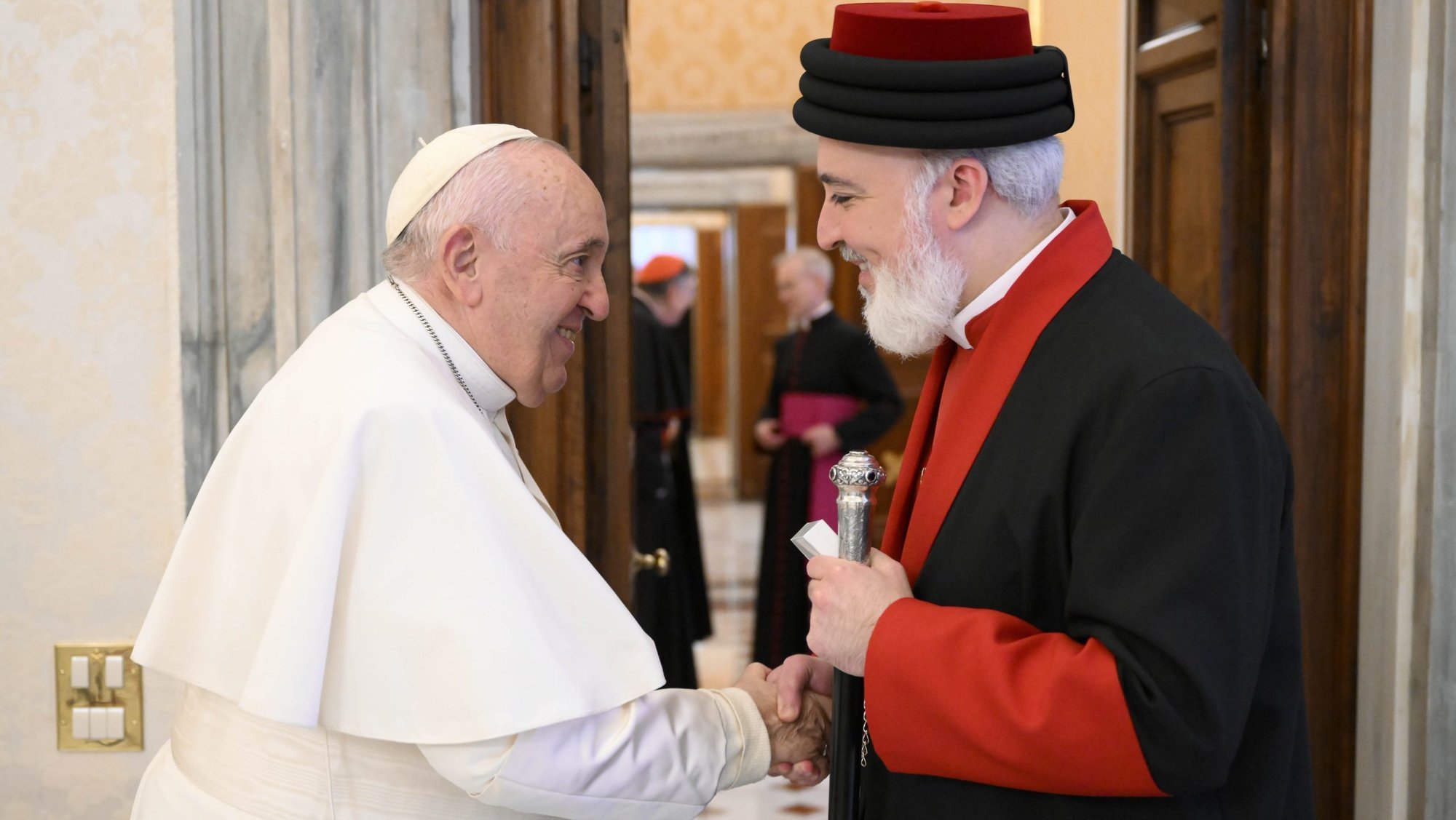 Pope Francis shakes hands with Catholicos Awa III, patriarch of the Assyrian Church of the East, at the end of a meeting Nov. 19, 2022, in the library of the Apostolic Palace at the Vatican. (CNS/Vatican Media)