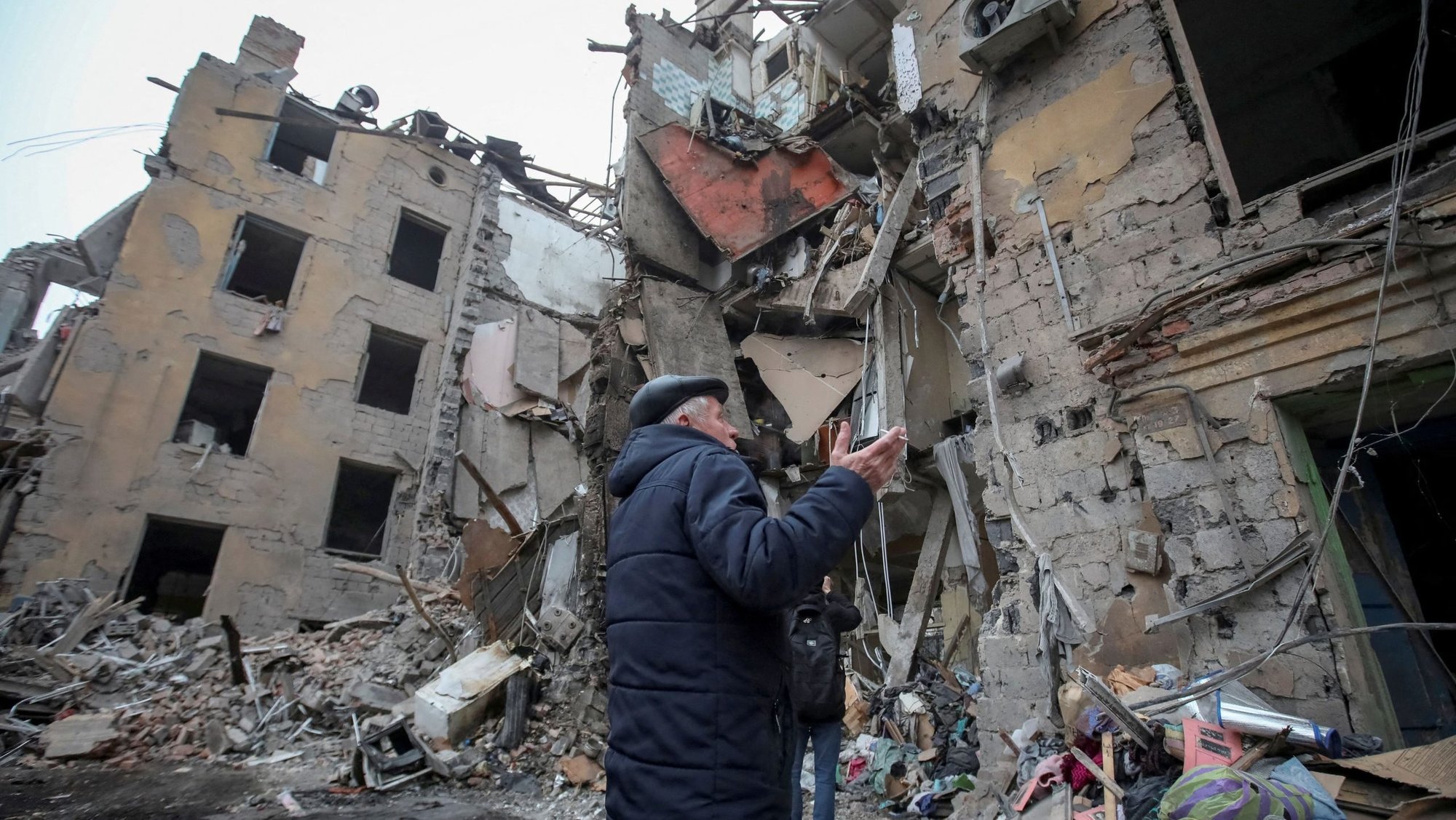 A local resident gestures outside a residential building in Kramatorsk, Ukraine, Feb. 2, 2022, which was destroyed by a Russian missile strike. (OSV News photo/Vyacheslav Madiyevskyy, Reuters)