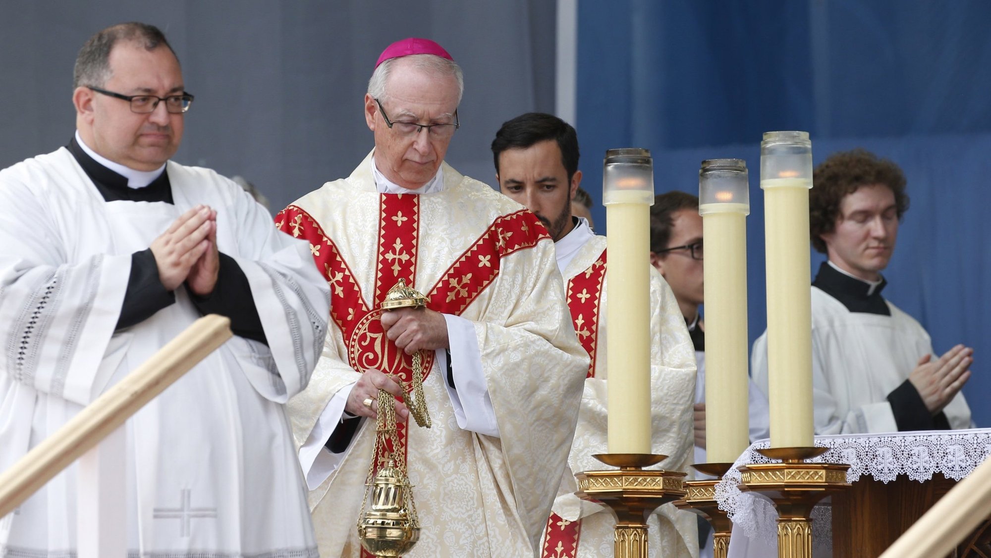 Archbishop Richard W. Smith of Edmonton, Alberta, burns incense as Pope Francis celebrates Mass at Commonwealth Stadium in Edmonton, Alberta, July 26, 2022. The Vatican announced Feb. 25, 2025, that Pope Francis has accepted the resignation of Archbishop J. Michael Miller, 75, of Vancouver, British Columbia, and appointed Archbishop Smith, 65, as his successor. (CNS photo/Paul Haring)