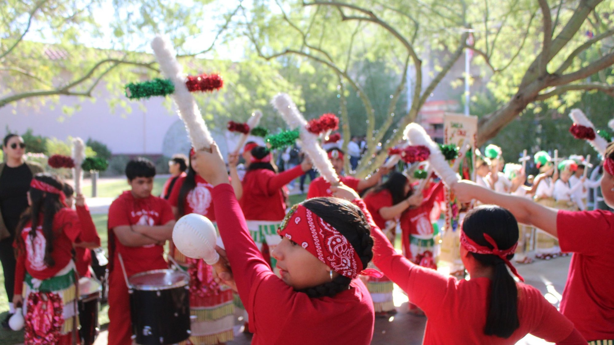 Matachines hold up decorated crosses to form a path for the clergy at the beginning of the Diocese of Phoenix’s annual Honor Your Mother outdoor Mass celebrating Our Lady of Guadalupe between St. Mary’s Basilica and the Phoenix Convention Center Dec. 7, 2024. (OSV News/Tony Gutiérrez)