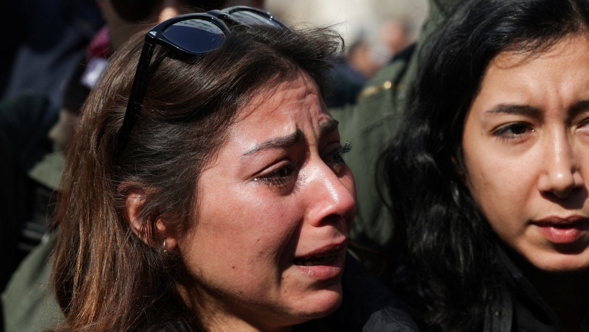 A woman reacts as people demonstrate in Marjeh Square in Damascus, Syria, March 9, 2025, to protest the killing of civilians and security forces linked to Syria's new rulers, following clashes between the forces loyal to the new administration and fighters from Bashar Assad's Alawite sect. (OSV News/Khalil Ashawi, Reuters)