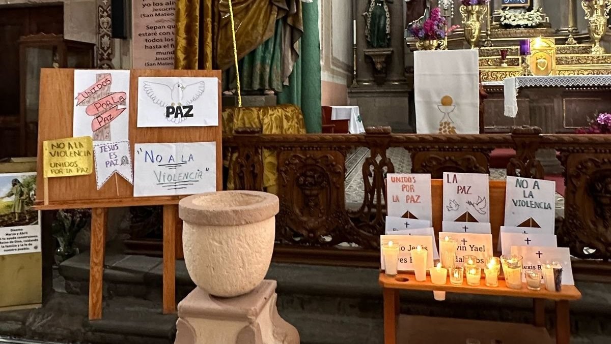 Candles are seen on the altar at the Church of the Visitation of the Blessed Virgin Mary in Mexico City March 23, 2025, in memory of eight young people shot dead outside a church in Salamanca, in western Guanajuato state, on March 16. (OSV News/courtesy courtesy Father Jorge Atilano)