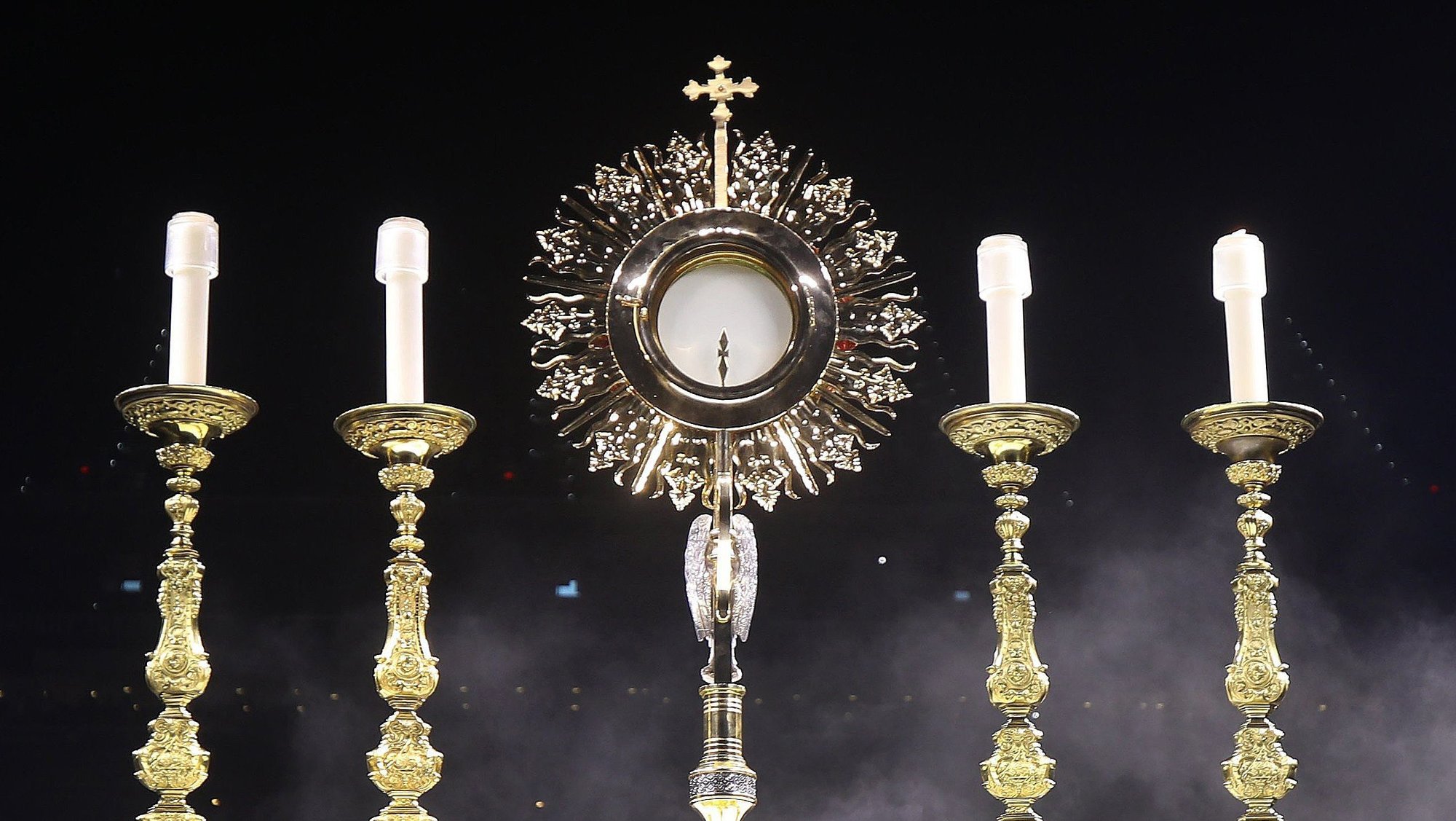 The monstrance is pictured during Eucharistic adoration at the July 18, 2024, second revival night of the National Eucharistic Congress at Lucas Oil Stadium in Indianapolis. The Archdiocese of Indianapolis said in a statement March 24 that natural causes -- not miraculous ones -- accounted for spots of red found on a host at St. Anthony of Padua Church in Morris, Ind., in February 2025. (OSV News photo/Bob Roller)
