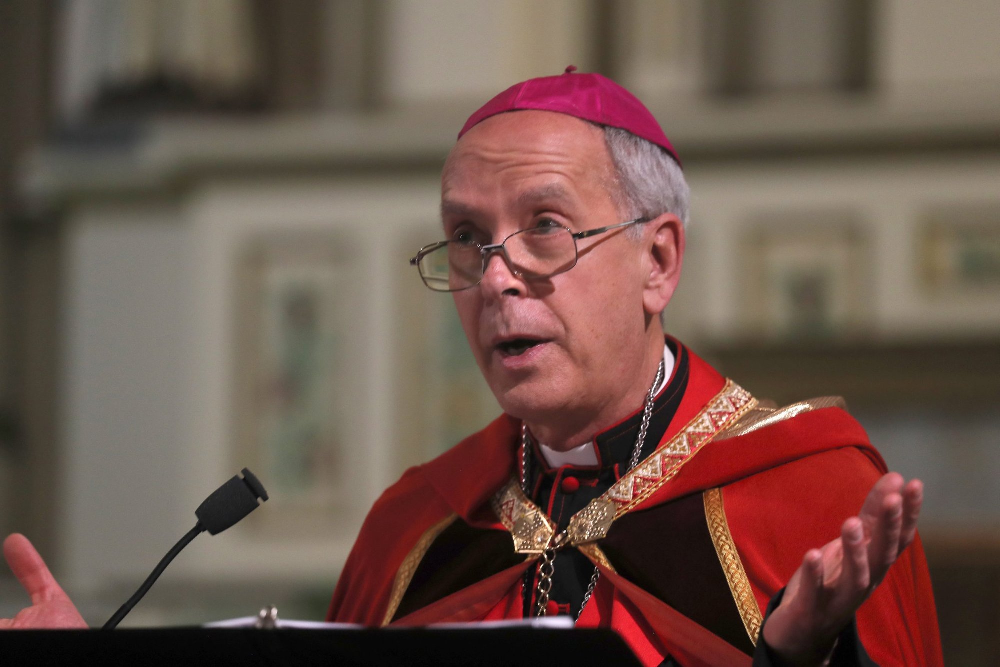 Bishop Mark J. Seitz of El Paso, Texas, leads a prayer vigil at Sacred Heart Church in El Paso March 24, 2025, following a rally and march against mass deportations by the US government. (OSV News photo/Bob Roller)