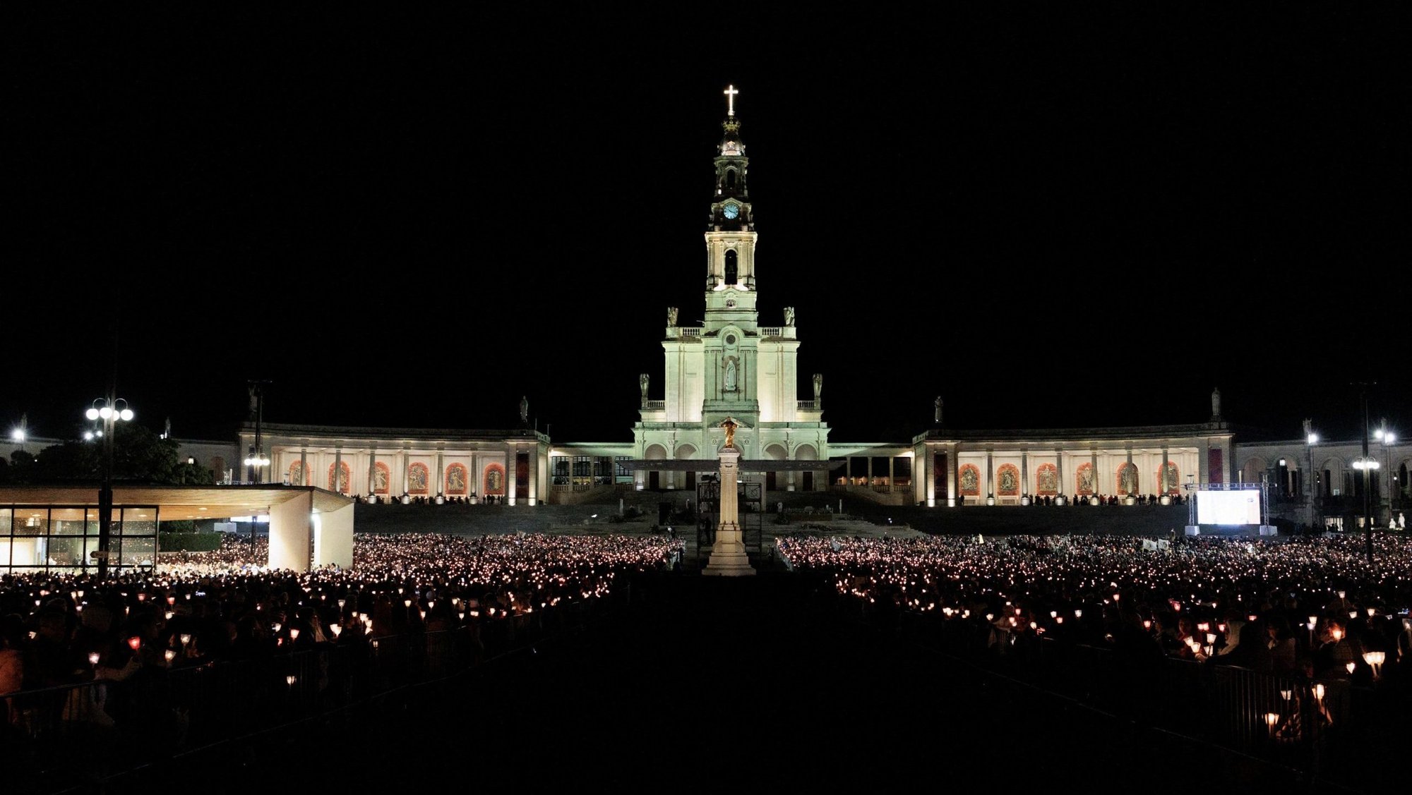Worshippers hold candles May 12, 2024, at the Shrine of Our Lady of Fatima in central Portugal. A spokesperson for the shrine said April 3, 2025, it is not considering the removal of artwork by Slovenian Father Marko Rupnik, who is accused of abusing several women in the past. On March 31, the Sanctuary of Our Lady of Lourdes in France announced it would cover mosaics created by the disgraced priest. (OSV News photo/Maria Abranches, Reuters)
