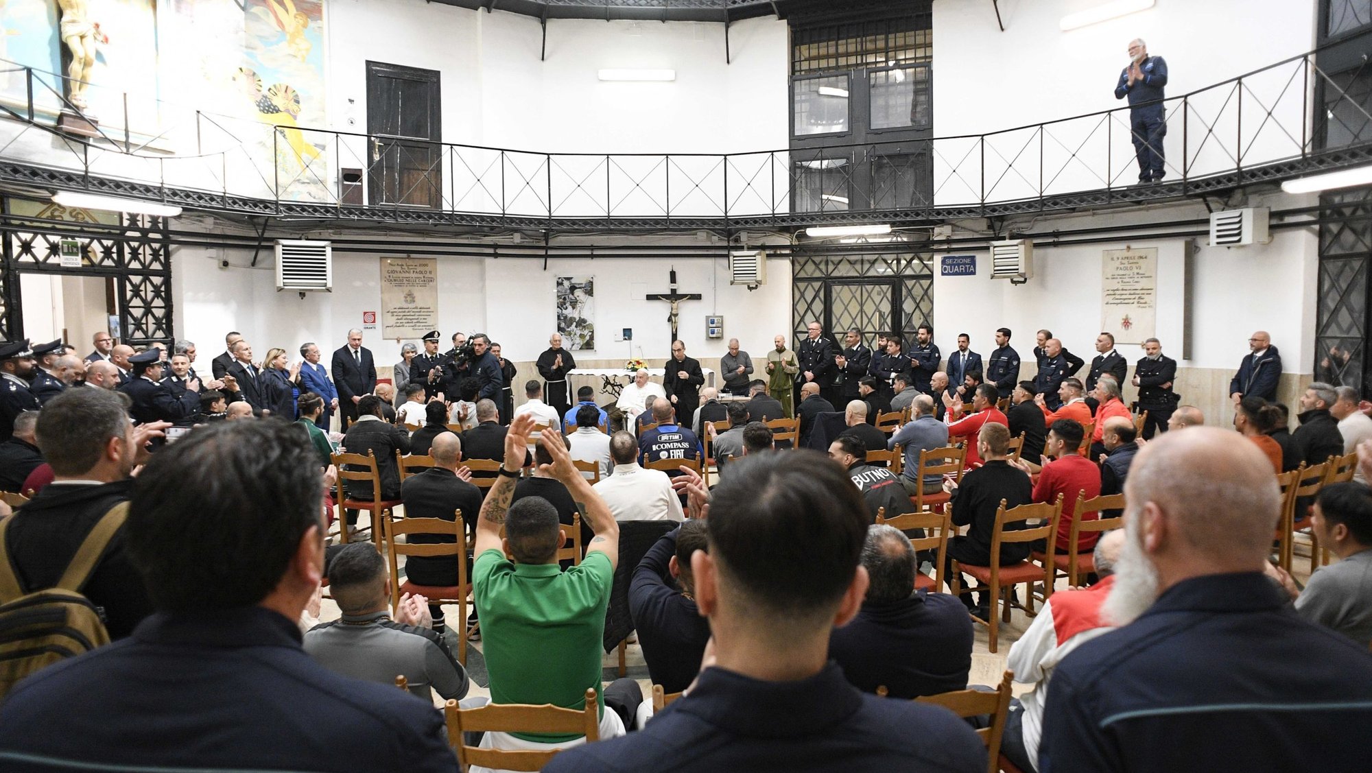 Pope Francis speaks to inmates during a Holy Thursday visit to Rome's Regina Coeli jail April 17, 2025. (CNS photo/Vatican Media)