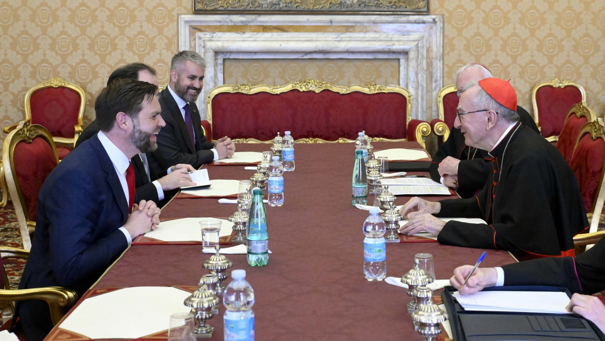 Cardinal Pietro Parolin, Vatican secretary of state, and Archbishop Paul R. Gallagher, Vatican foreign minister, meet with U.S. Vice President JD Vance and members of his entourage in the Apostolic Palace at the Vatican April 19, 2025. (CNS photo/Vatican Media)