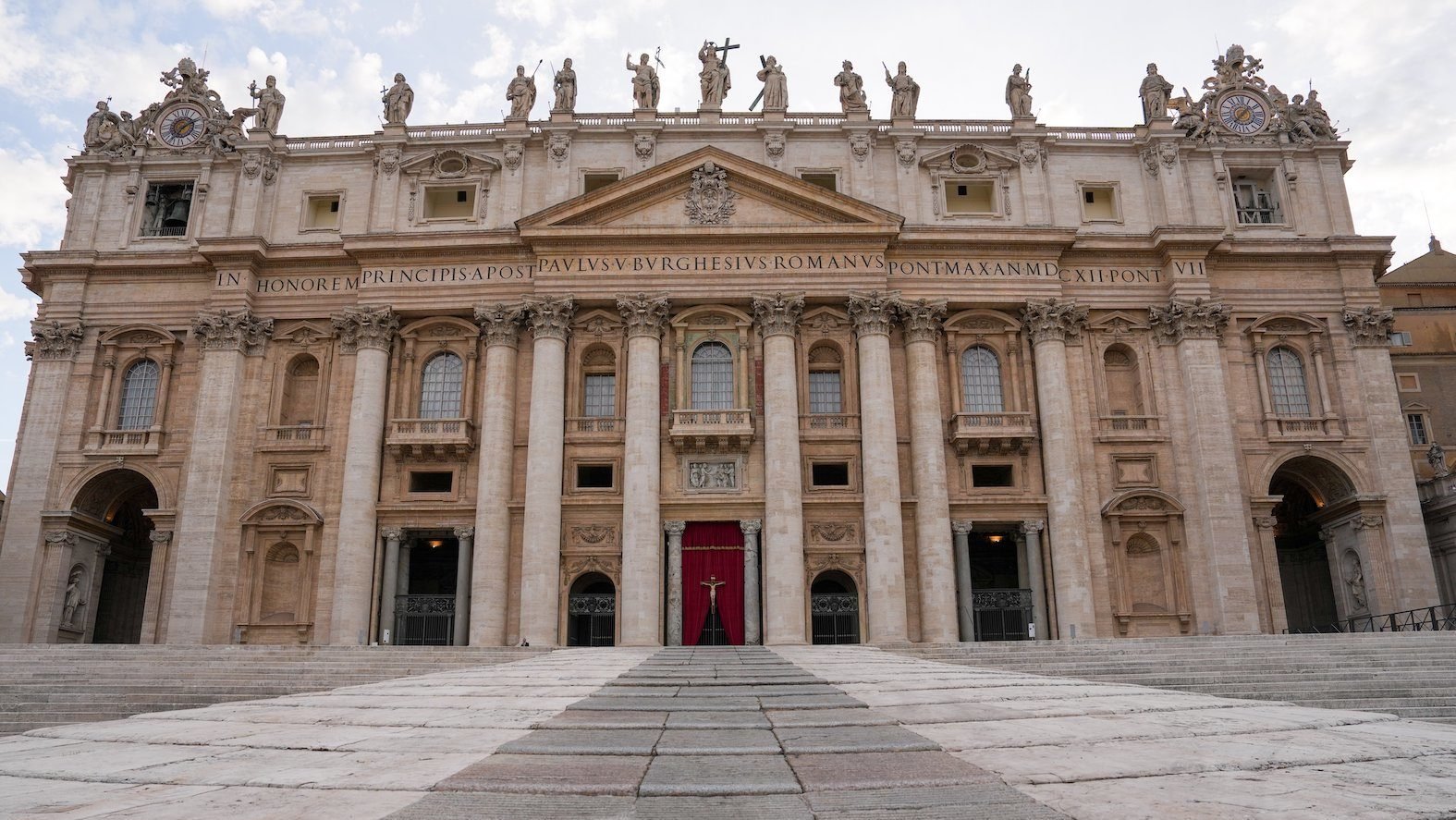 The steps of St. Peter's Basilica at the Vatican, with thousands of Easter flowers removed, is seen April 21, 2025, just before people begin praying the rosary for the repose of the soul of Pope Francis. (CNS photo/Lola Gomez)