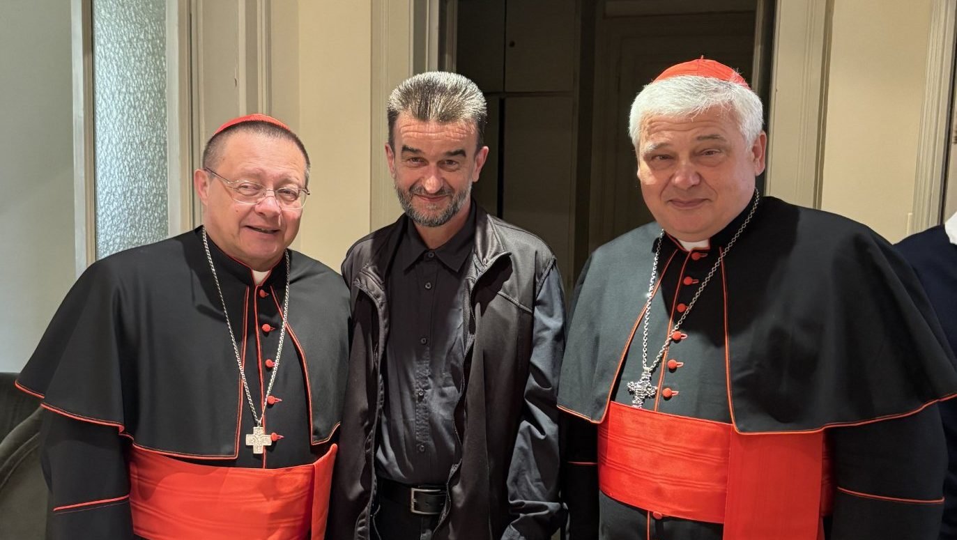 Rudolf, from Slovakia, center, was once homeless but now has a stable job and can stand on his own two feet thanks to the help he got from Pope Francis and his almoner, Polish Cardinal Konrad Krajewski, right. Cardinal Krajewski and his fellow Pole Cardinal Grzegorz Rys are pictured with Rudolf April 25, 2025, as they were leaving Cardinal Krajewski's apartment at the Vatican to head to the general congregation of cardinals. (OSV News photo/Paulina Guzik)