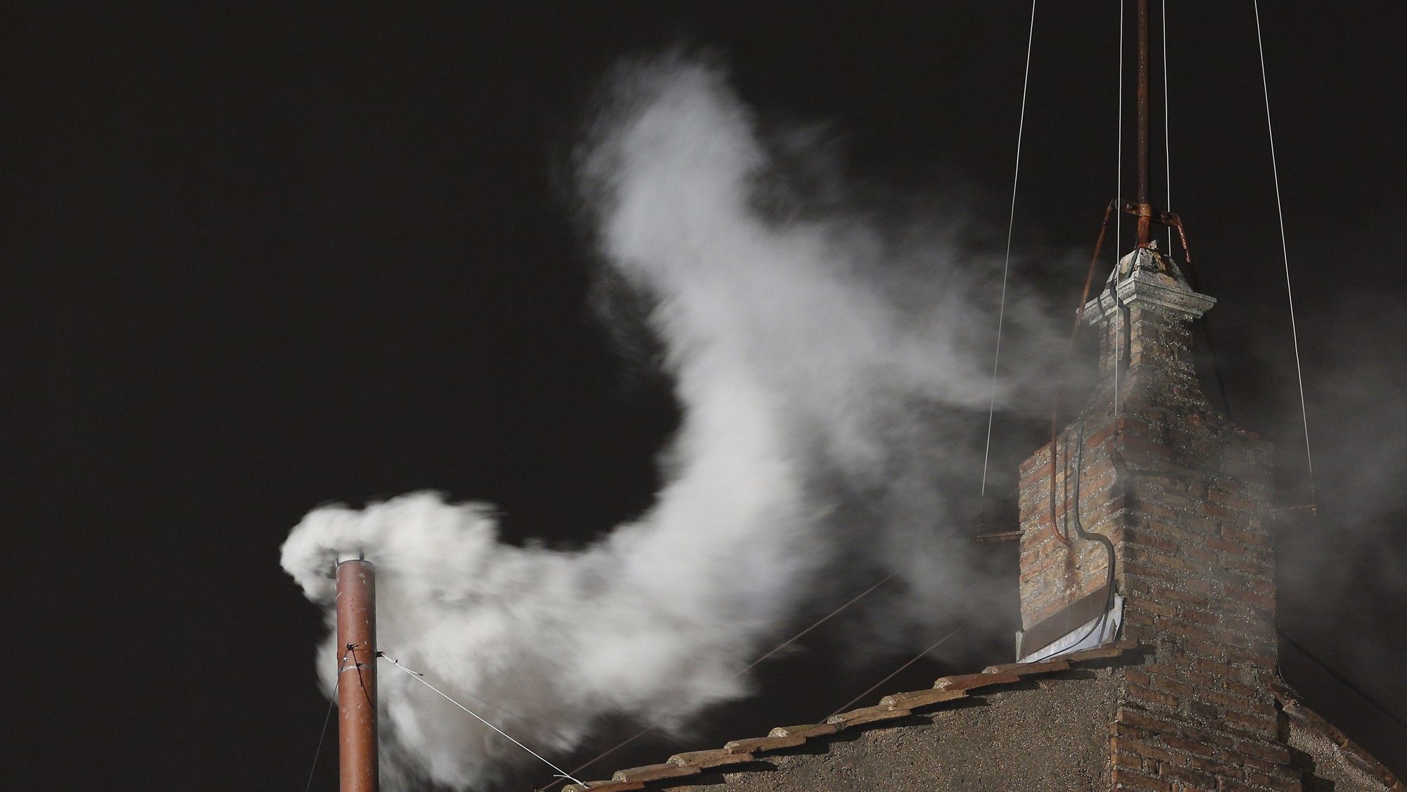 White smoke billows from the chimney of the Sistine Chapel March 13, 2013, at the Vatican signaling that Argentine Cardinal Jorge Mario Bergoglio, who became Pope Francis, was elected the 266th Roman Catholic pontiff. (CNS/Paul Haring)