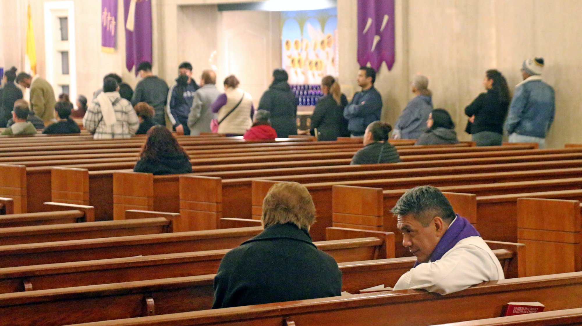 Despite four priests hearing confessions at a time, there were long lines of people waiting to confess at St. John Chrysostom Church in Inglewood the evening of Friday, March 28, 2025. The parish was one of several around the LA Archdiocese that stayed open overnight for the "24 Hours for the Lord" Jubilee Year initiative that weekend. (Pablo Kay)