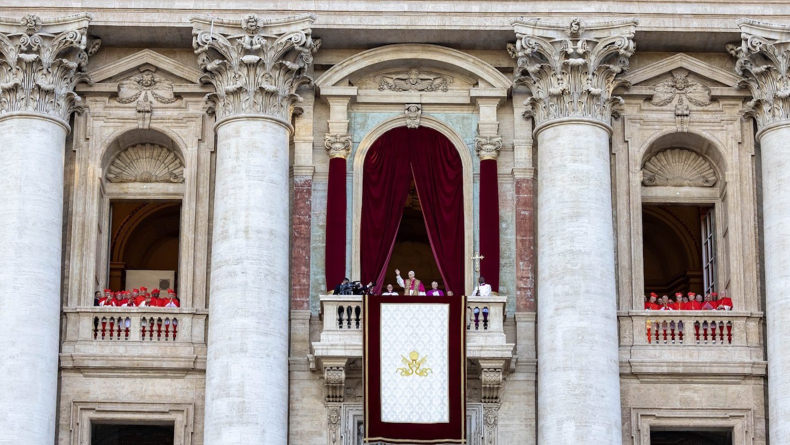 Pope Leo XIV, the former Cardinal Robert F. Prevost, waves to the crowds in St. Peter's Square at the Vatican after his election as pope May 8, 2025. The new pope was born in Chicago. (CNS photo/Pablo Esparza)
